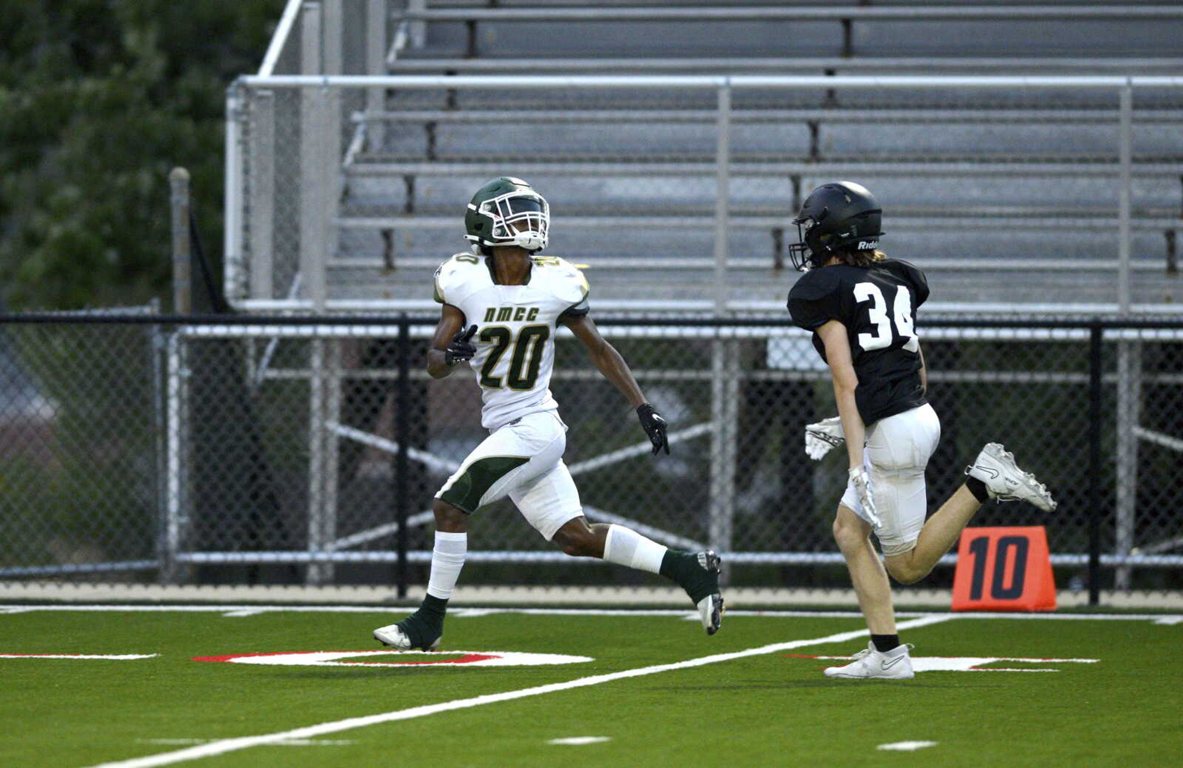 NMCC's AJ Ruff (20) tracks down a ball in the air during a scrimmage at Jackson High School earlier this summer.