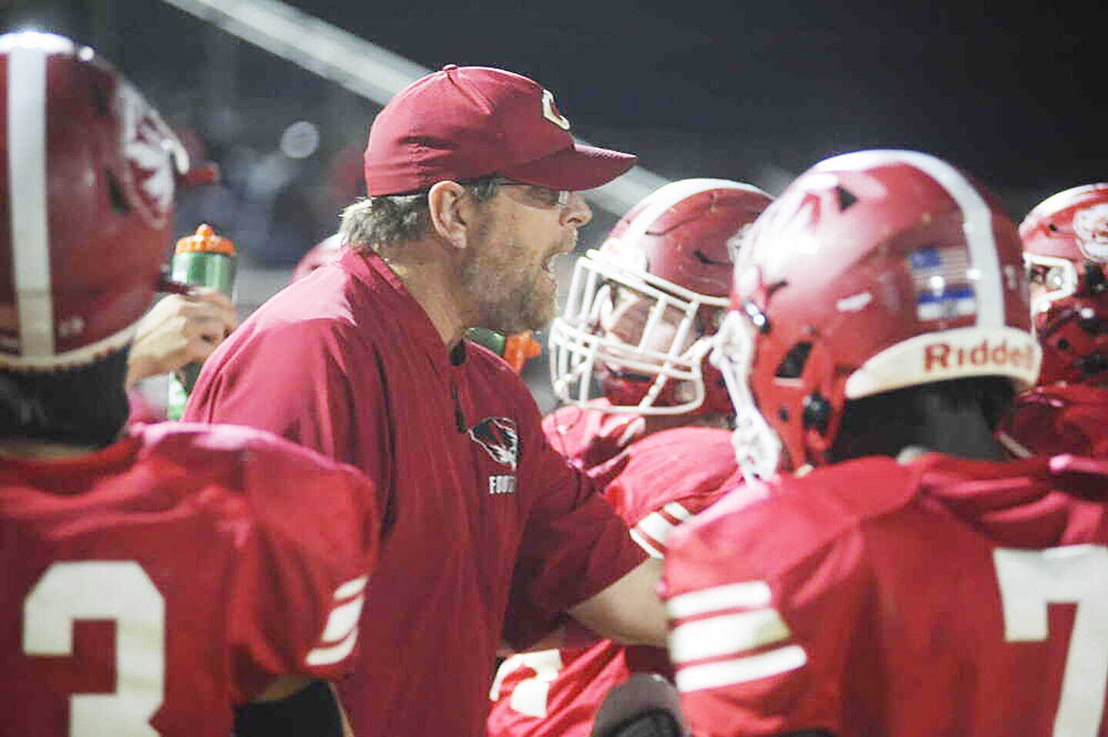 Caruthersville assistant football coach Brad Treece talks to the Tigers during a timeout in a Class 1 District 1 first-round playoff game versus Kelly dated Friday, Oct. 27.