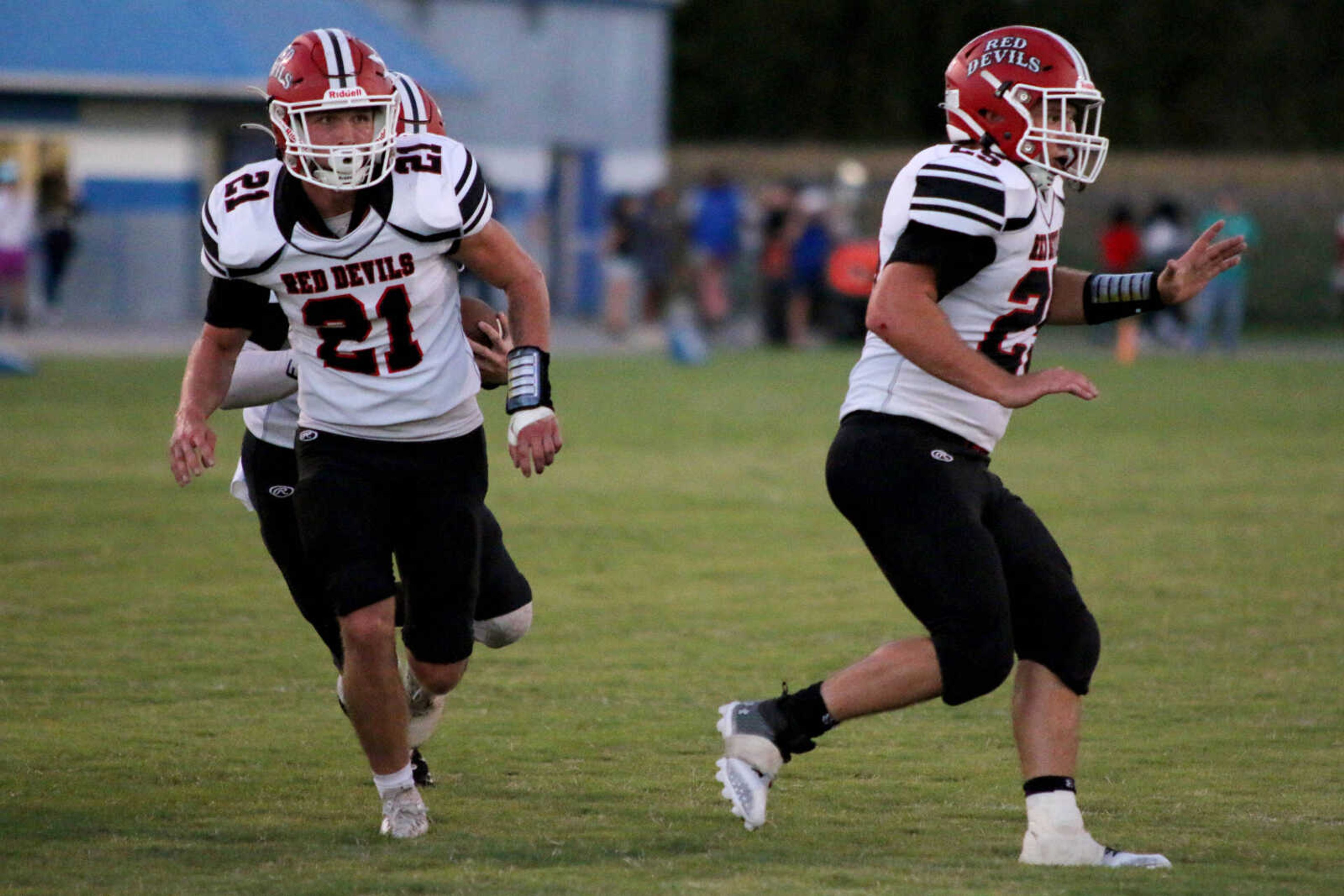 Chaffee's Levi McKinnie (21) and Carter Cossou (25) lead block&nbsp;during a 14-12 win at John Harris Marshall Stadium in Charleston, Missouri on Thursday, August 31, 2023.&nbsp;