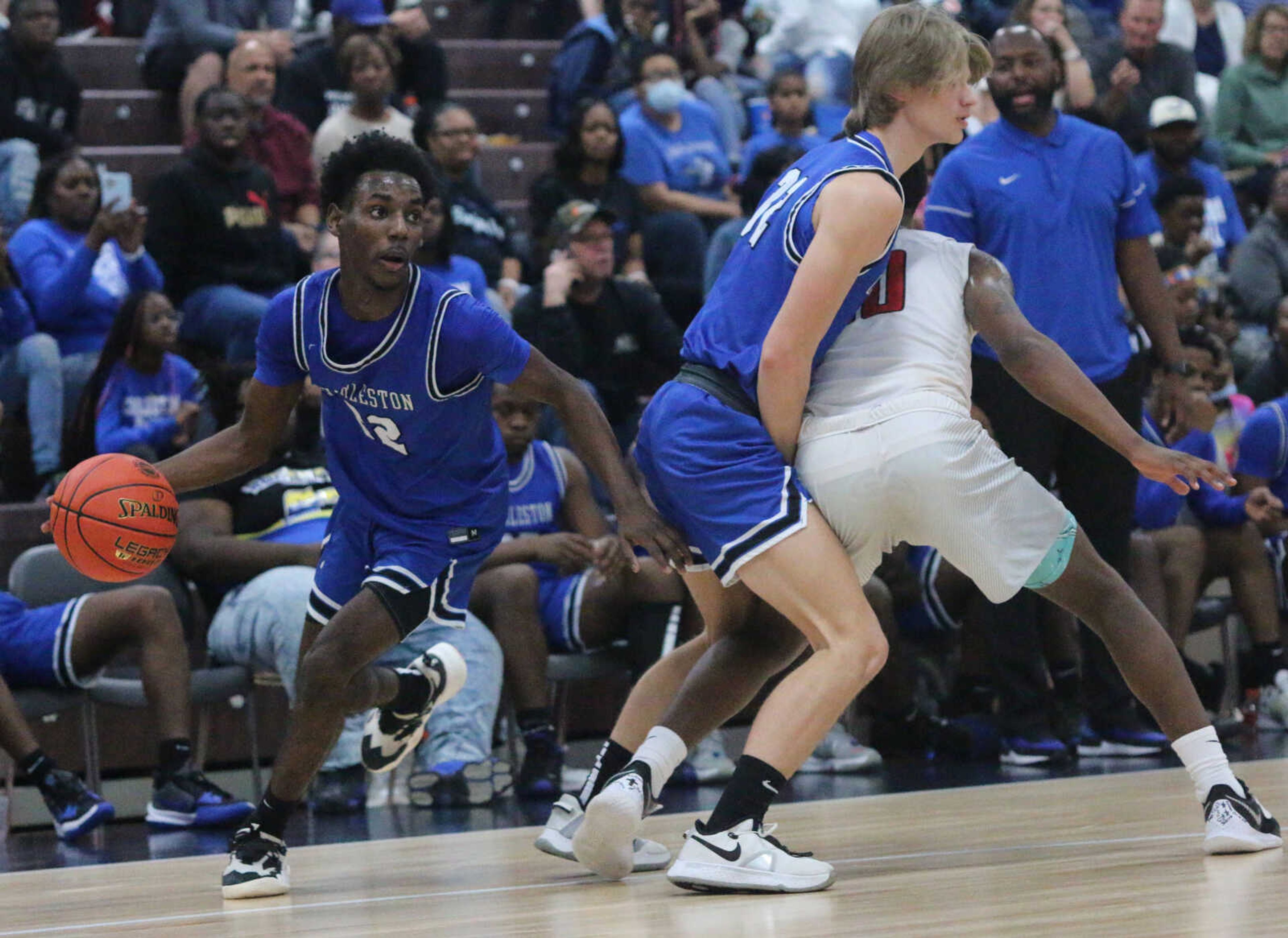 Ben Bledsoe sets a screen for Fletravion Stanback during Charleston's 74-61 win over Bishop DuBourg in a Class 3 quarterfinal at the Farmington Community Civic Center on Saturday, March 5. (Dennis Marshall/Standard-Democrat)