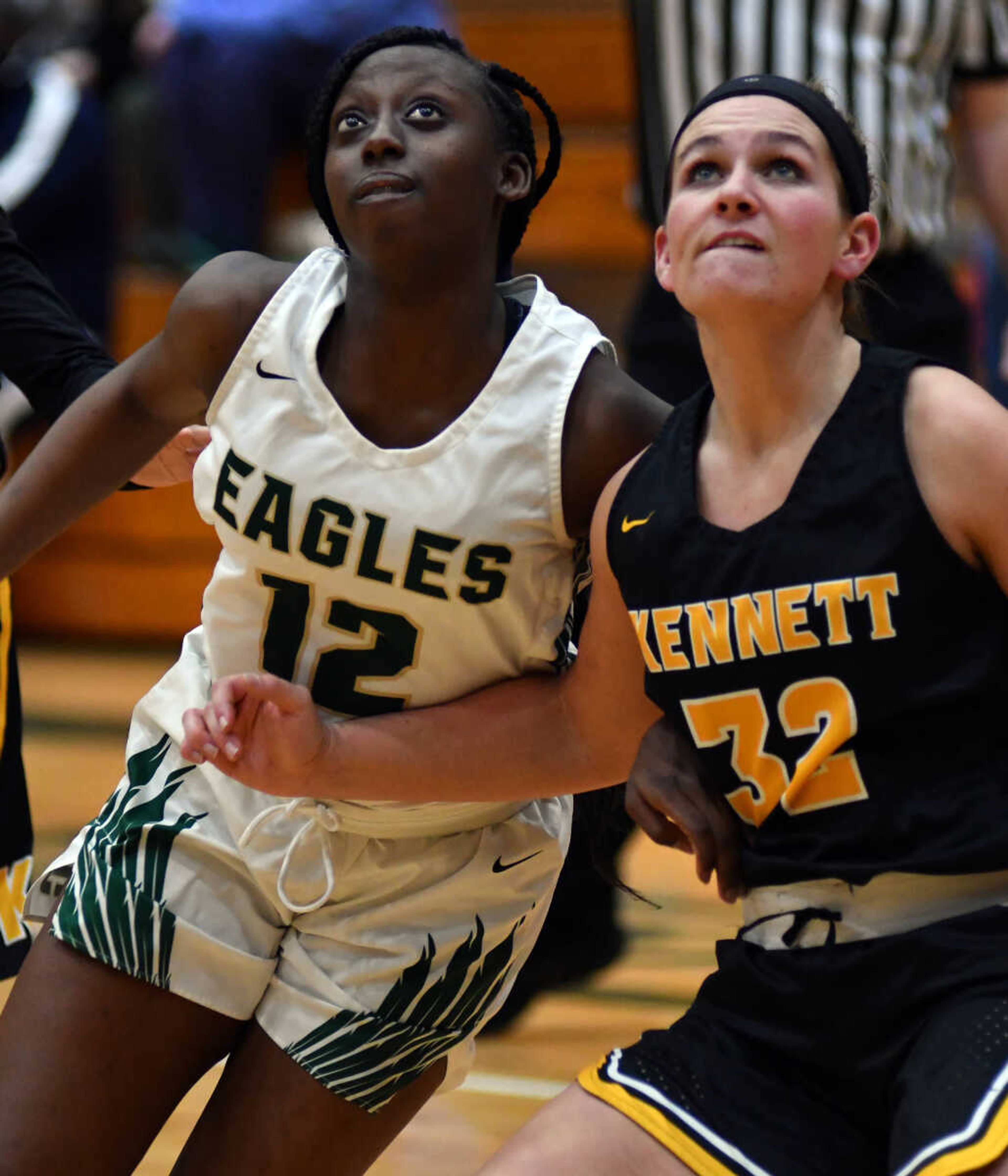 New Madrid County Central's Shakyra Wright battles Kennett's Anelle Harris in the Class 4 District 1 girls basketball semifinal last season at New Madrid.