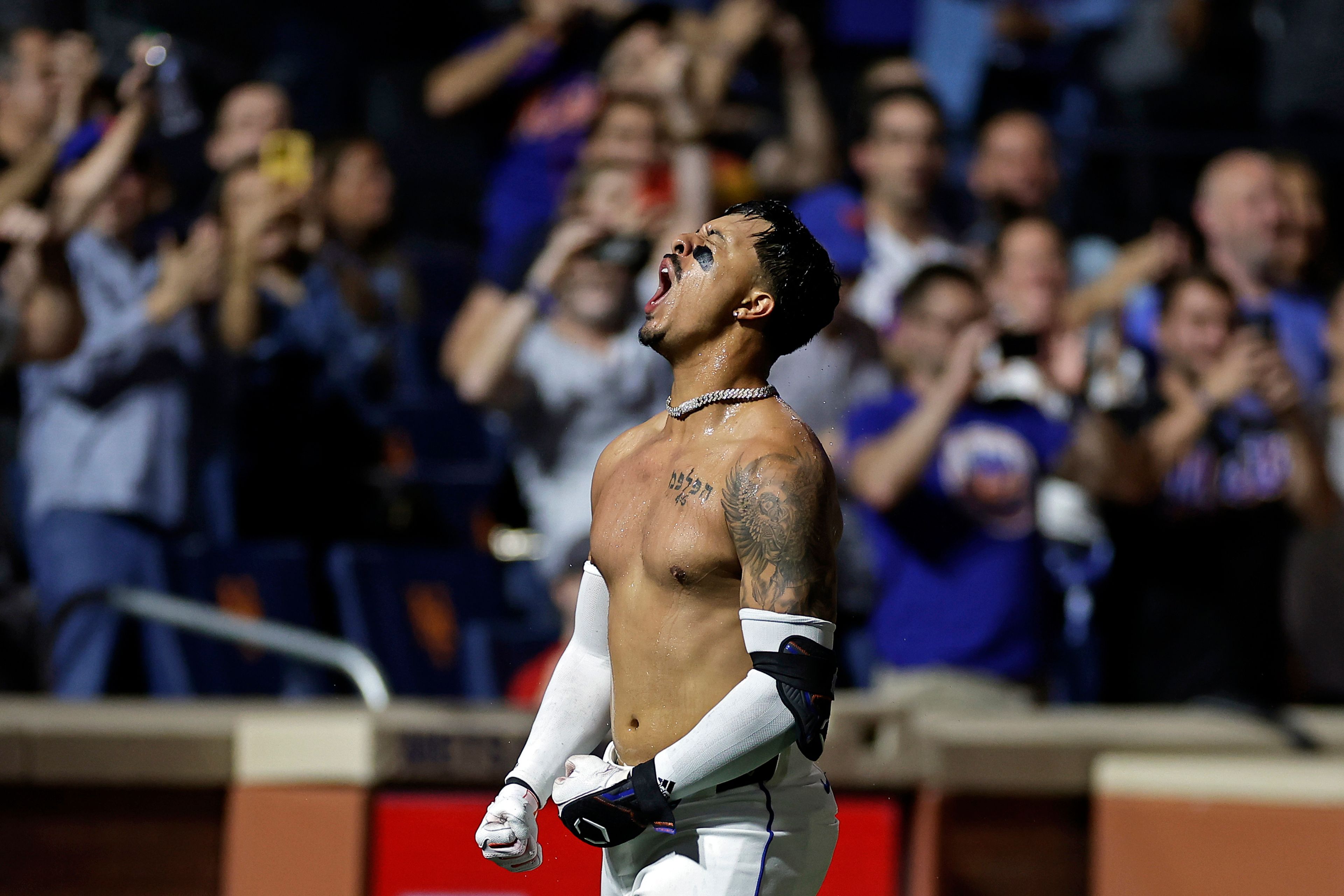 New York Mets' Mark Vientos reacts after hitting a two-run walkoff home run during the 10th inning of a baseball game against the Cincinnati Reds, Friday, Sept. 6, 2024, in New York. (AP Photo/Adam Hunger)