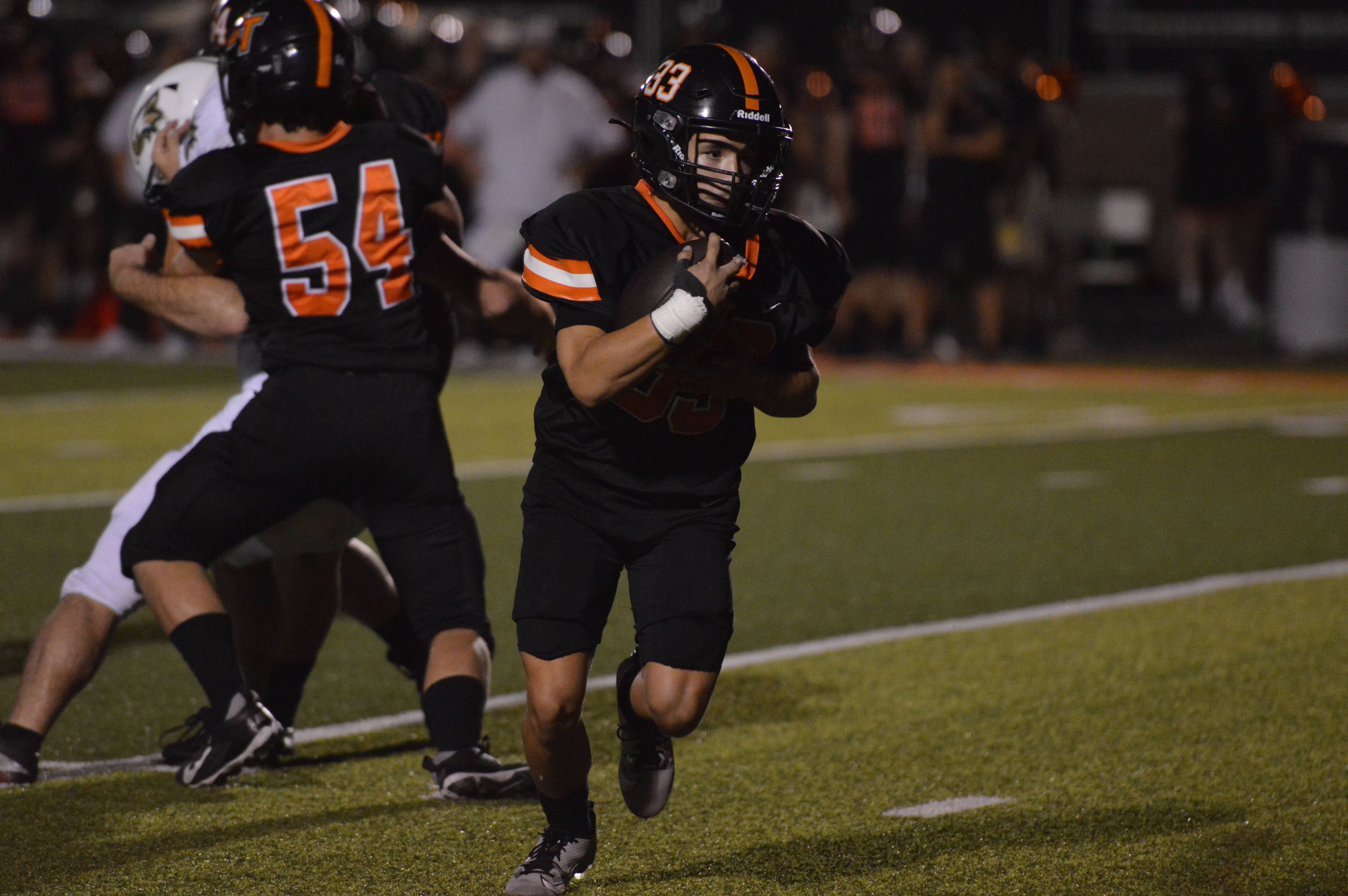 Cape Central sophomore running back Kenny Lewis runs free in the fourth quarter against New Madrid County Central on Friday night. 