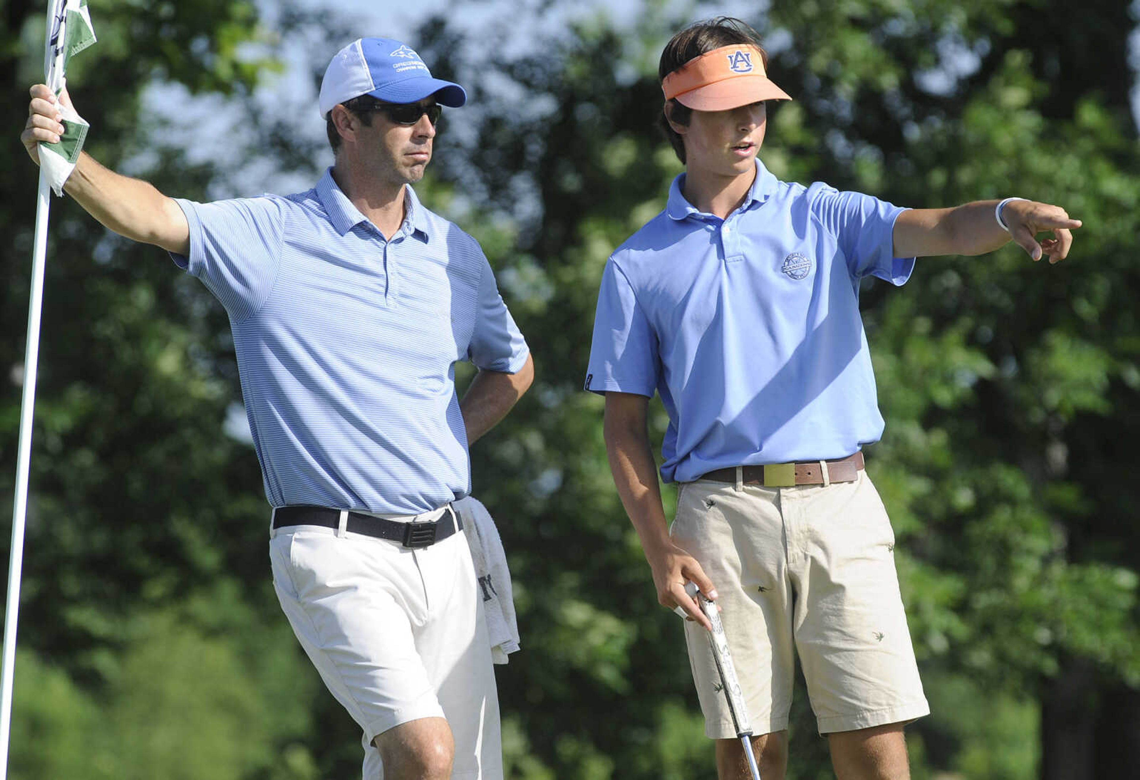 FRED LYNCH ~ flynch@semissourian.com
Tanner Walton of Jackson, right, confers with his father, Zack Walton, on the third green Tuesday, June 19, 2018 during the Missouri Amateur Championship at Dalhousie Golf Club.