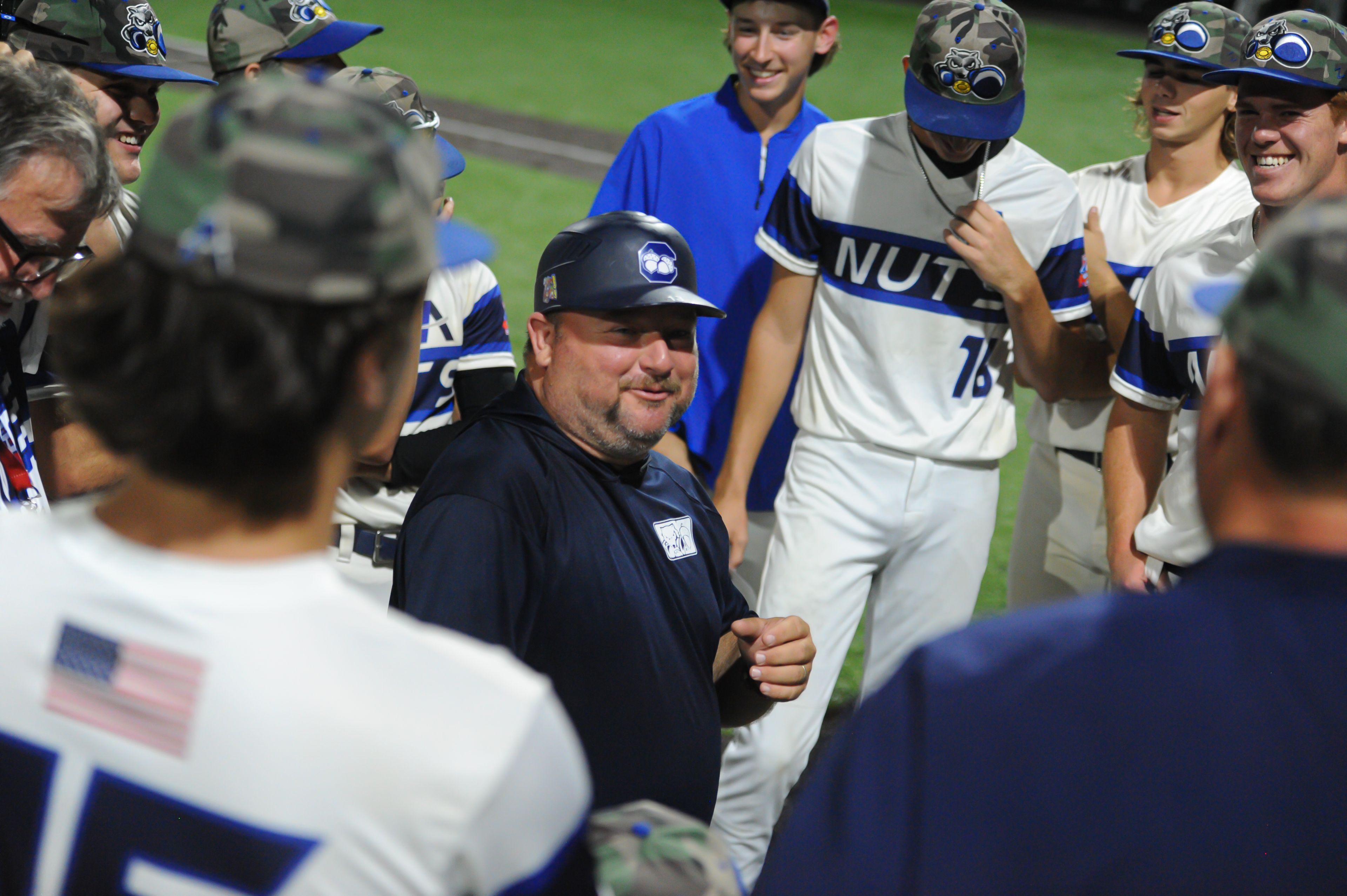 Aycorp's Michael Minner smiles in his postgame huddle following a Monday, August 12, 2024 Babe Ruth World Series game between the Aycorp Fighting Squirrels and Altoona, Pennsylvania. Aycorp won, 13-3 in five innings.