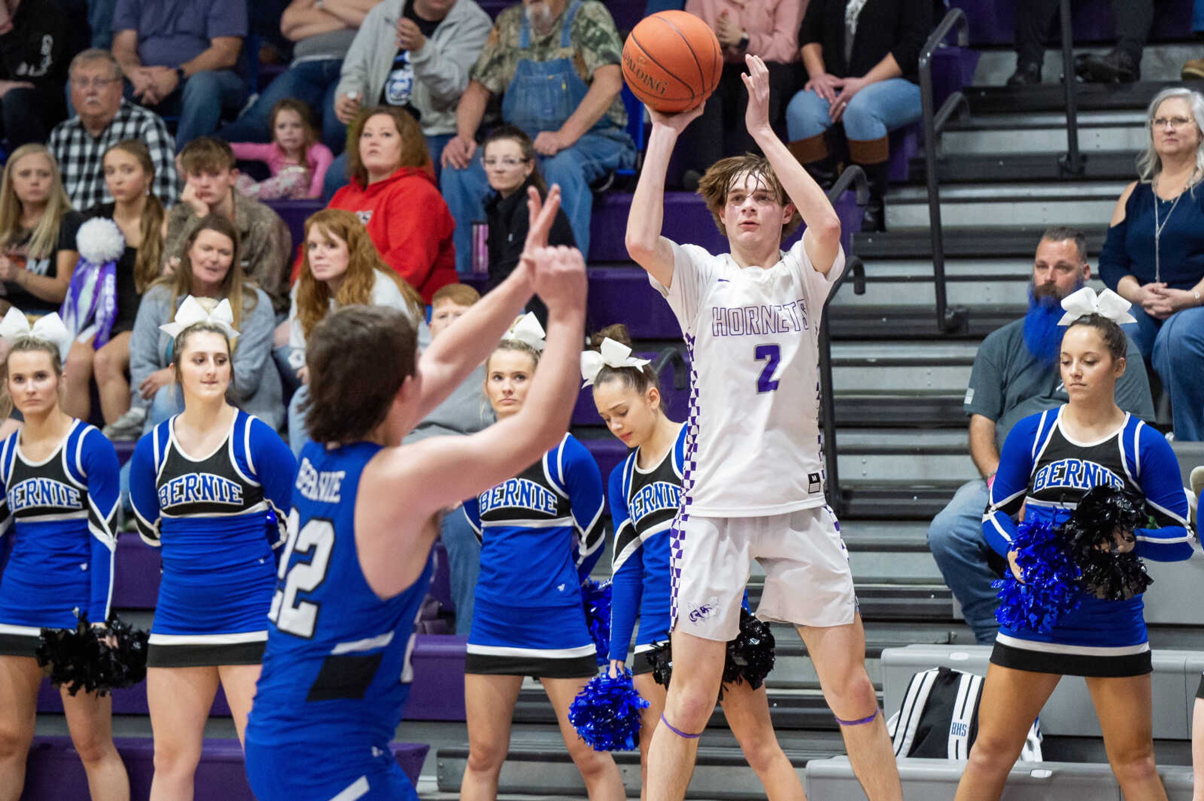 Holcomb's Noah Kenner (2) attempts a three-point shot during a game against Bernie Friday, Feb. 2, 2024.