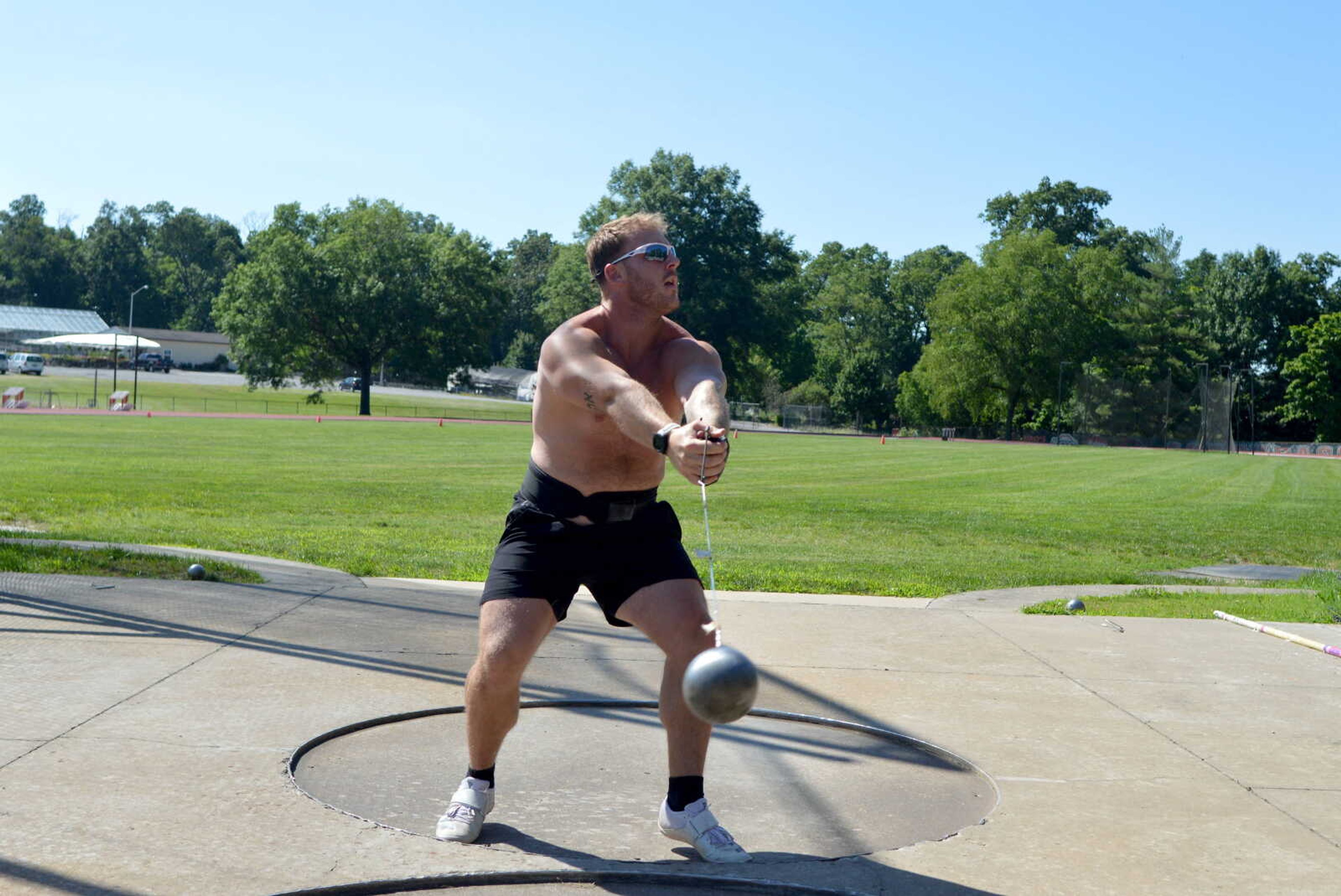 Southeast Missouri State alum Logan Blomquist practices his hammer throw technique Thursday, June 13, at the Abe Stuber Track Complex in Cape Girardeau. 