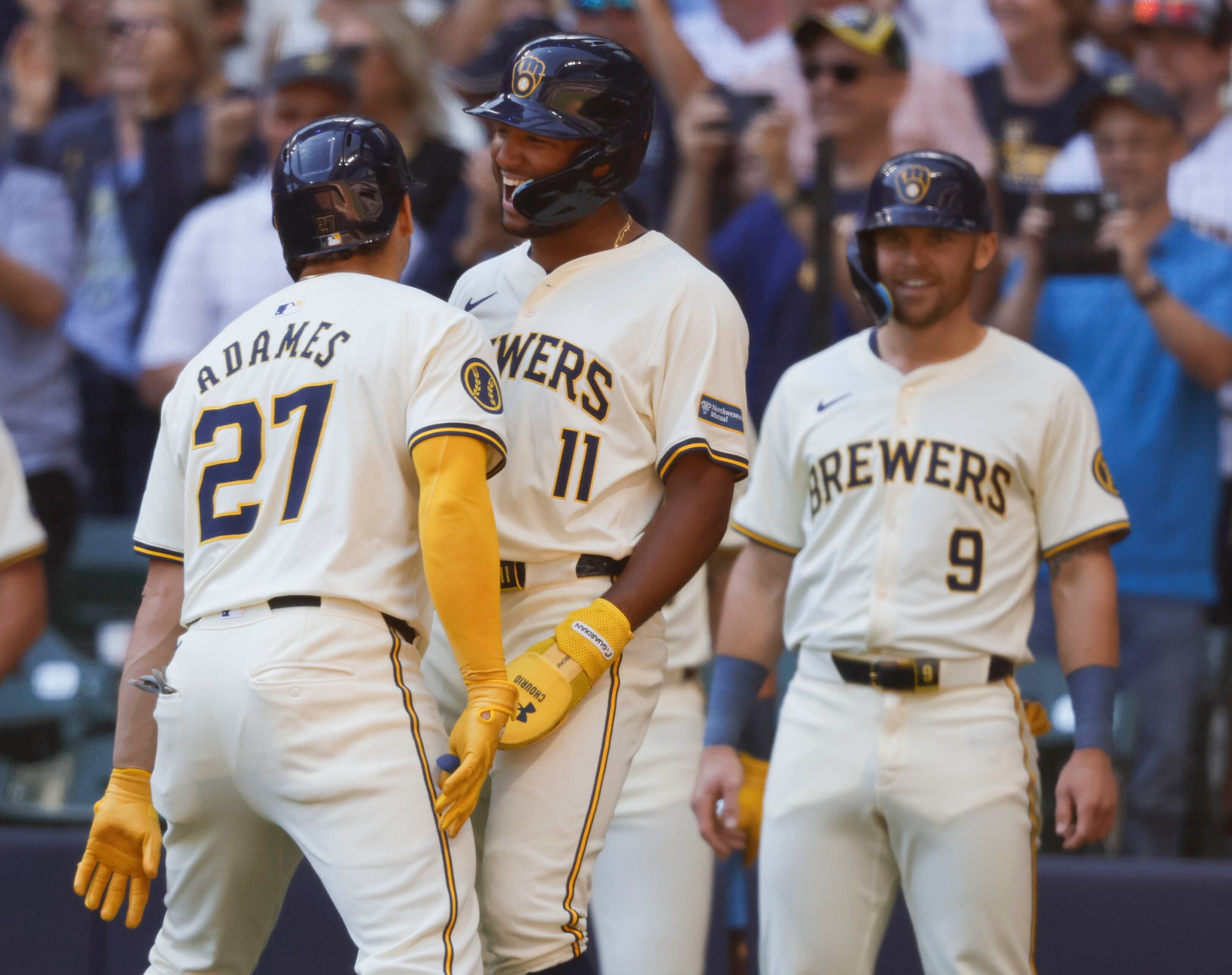 Milwaukee Brewers Willy Adames (27) reacts with Jackson Chourio(11) after his three-run home run during the first inning of a baseball game against the St. Louis Cardinals Monday, Sept. 2, 2024, in Milwaukee. (AP Photo/Jeffrey Phelps)