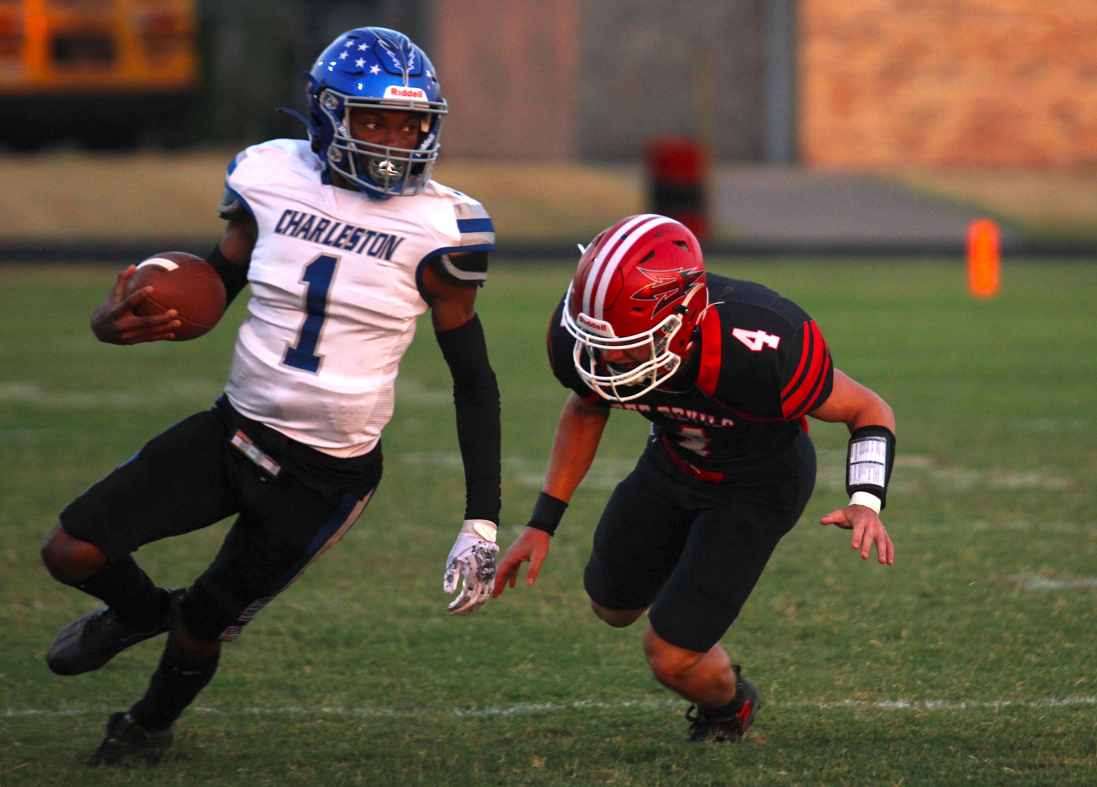 Charleston's Barnard Betts evades Chaffee's Logan Horton  during the Friday, September 6, 2024 game between the  Blue Jays and the Chaffee Red Devils at Chaffee High School in Chaffee, Mo. Charleston defeated Chaffee 38-0. 