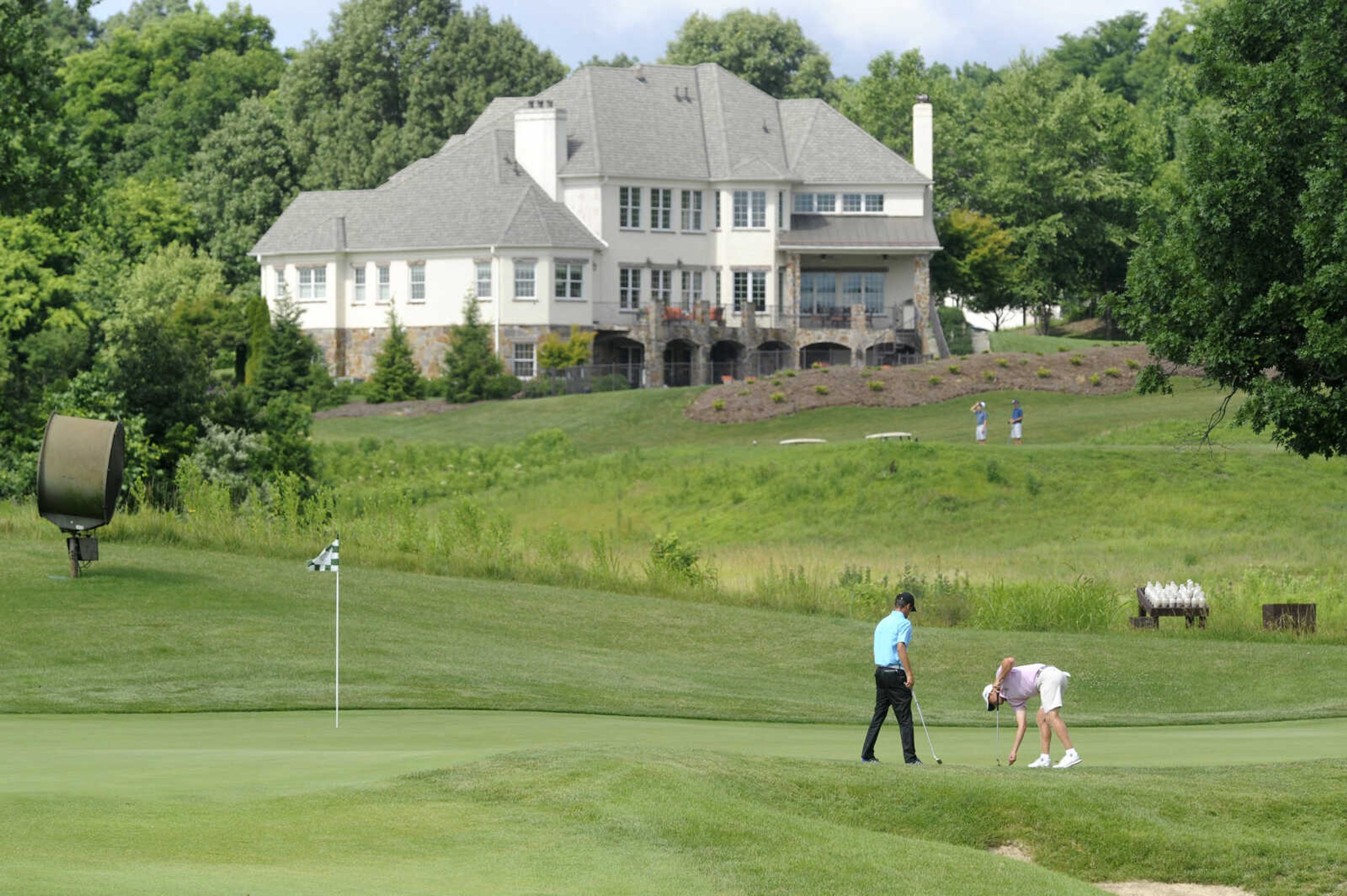 FRED LYNCH ~ flynch@semissourian.com
Travis Simmons, right, of Cape Girardeau prepares to putt on the first hole in his match with Ian Barnes of Licking, Missouri on Friday, June 22, 2018 during the Round of 32 in the Missouri Amateur Championship at Dalhousie Golf Club.