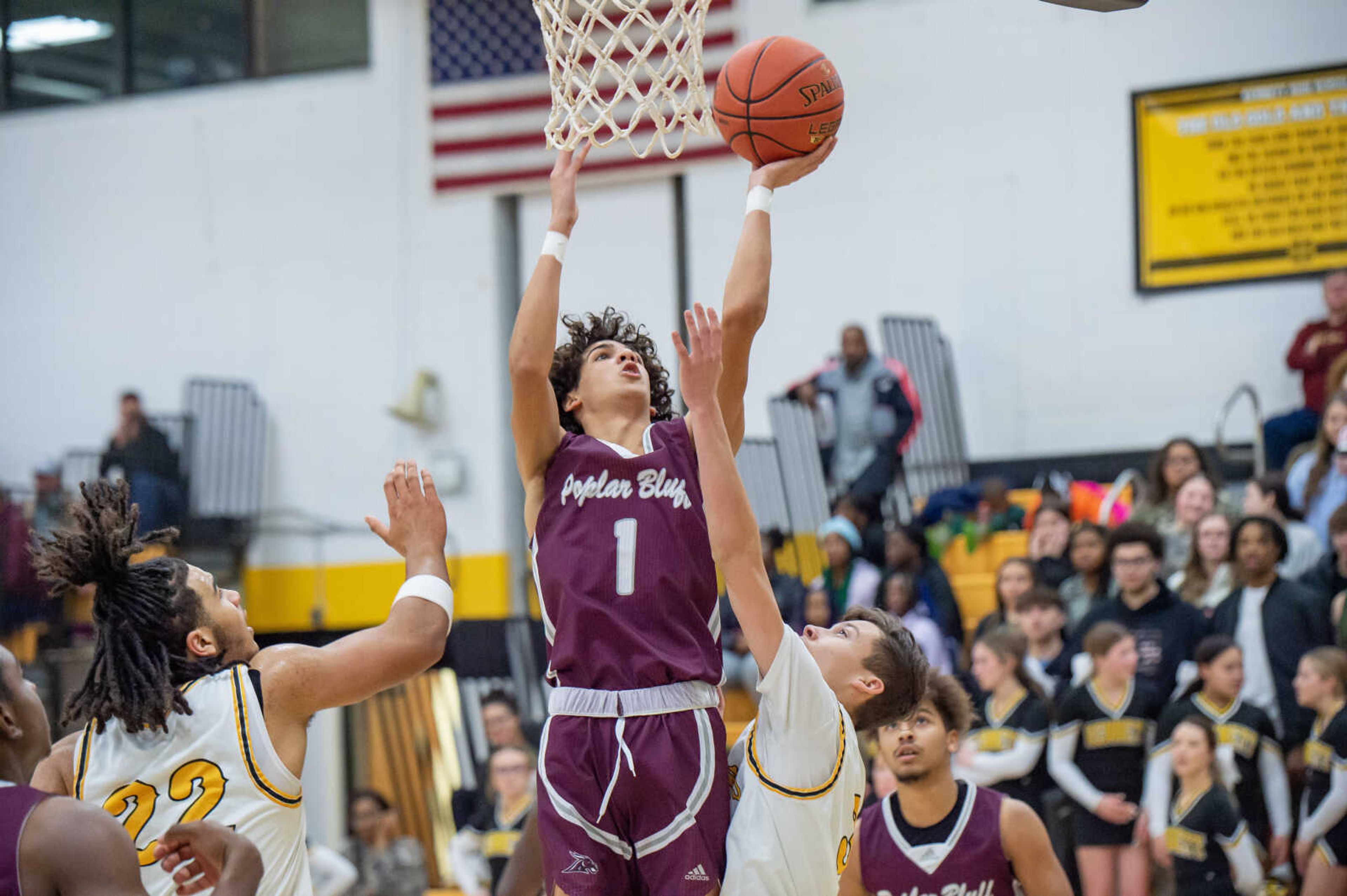 Poplar Bluff guard Isaiah Nevel attempts a layup while he is guarded by Kennett's Dyson Watson Tuesday, Jan. 23, 2024. 