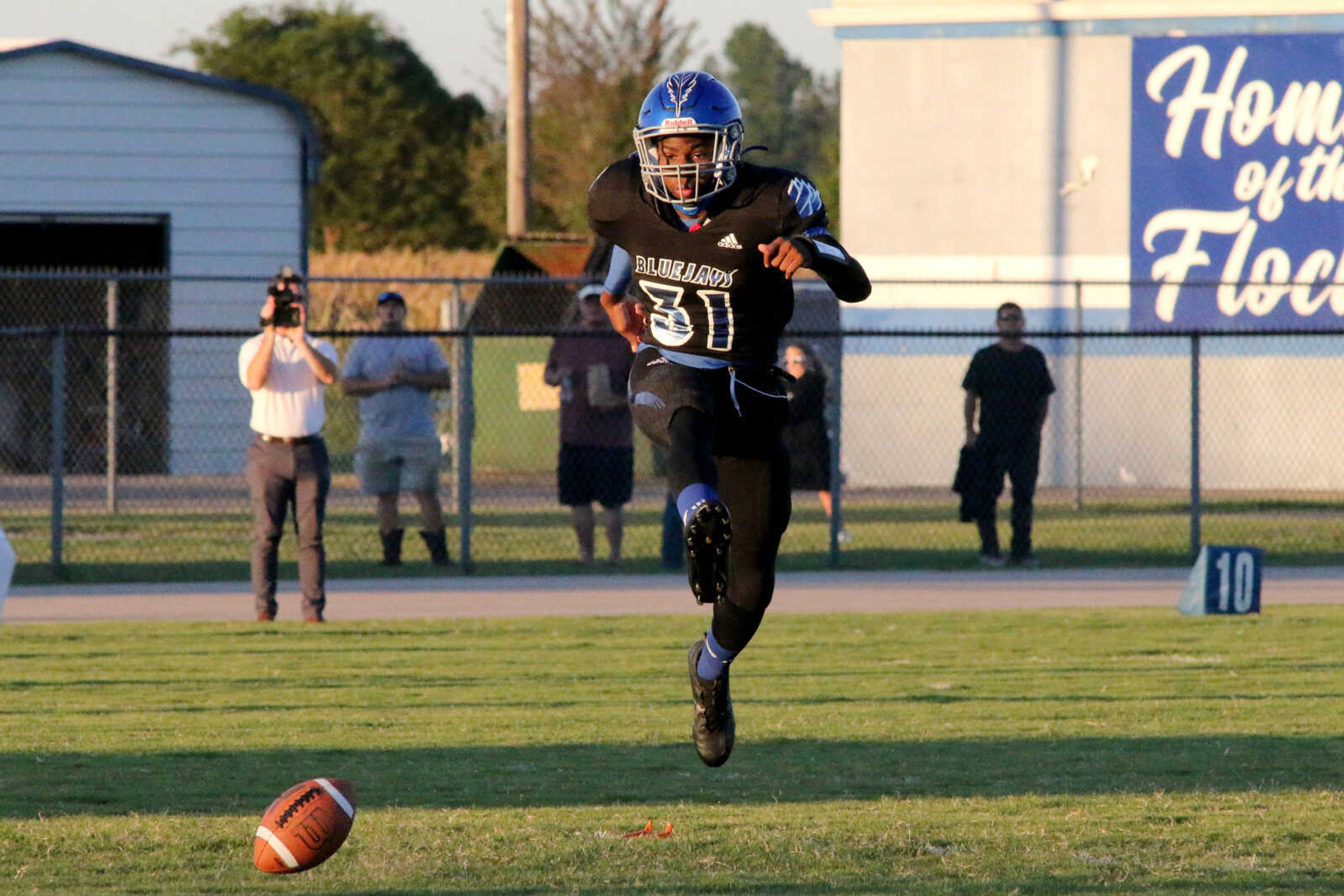 Charleston's Zachyran Thomas (31) attempts an onside kick&nbsp;during a 14-12 loss to Chaffee at John Harris Marshall Stadium on Thursday, August 31, 2023.&nbsp;