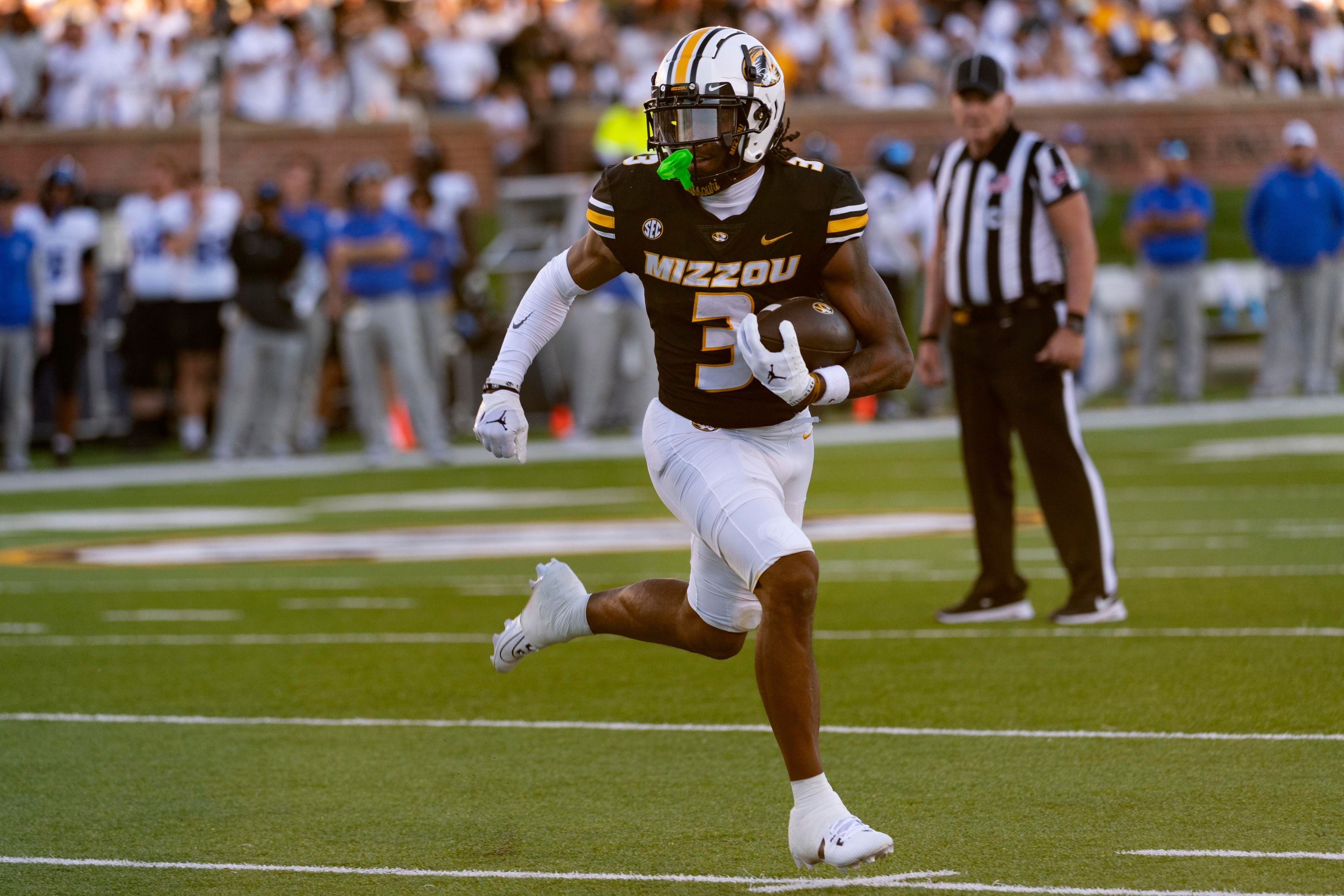 Missouri wide receiver Luther Burden III runs for a touchdown during the first half of an NCAA college football game against Buffalo, Saturday, Sept. 7, 2024, in Columbia, Mo. (AP Photo/L.G. Patterson)