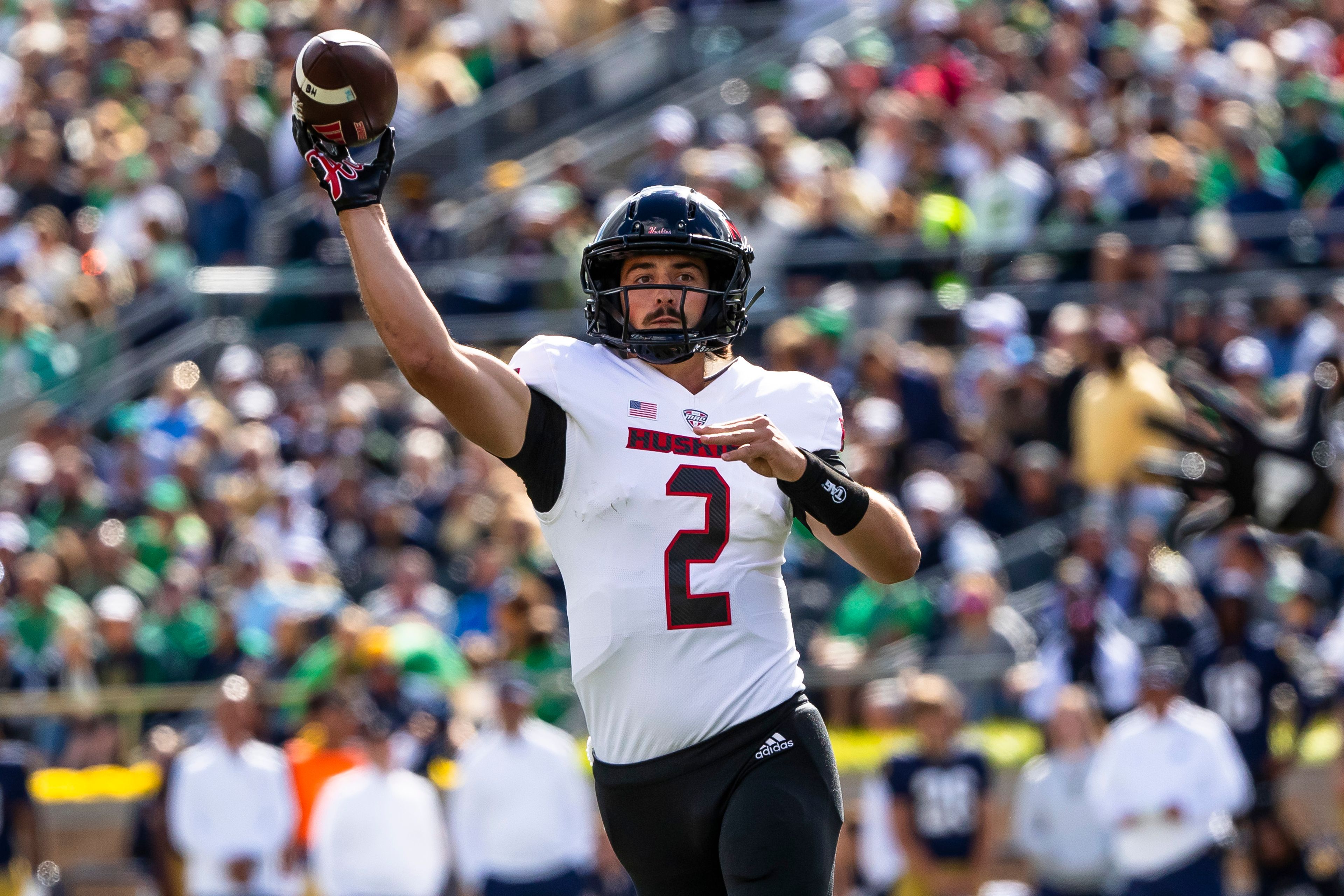 Northern Illinois quarterback Ethan Hampton throws a pass during an NCAA college football game against Notre Dame, Saturday, Sept. 7, 2024, in South Bend, Ind. (AP Photo/Michael Caterina)