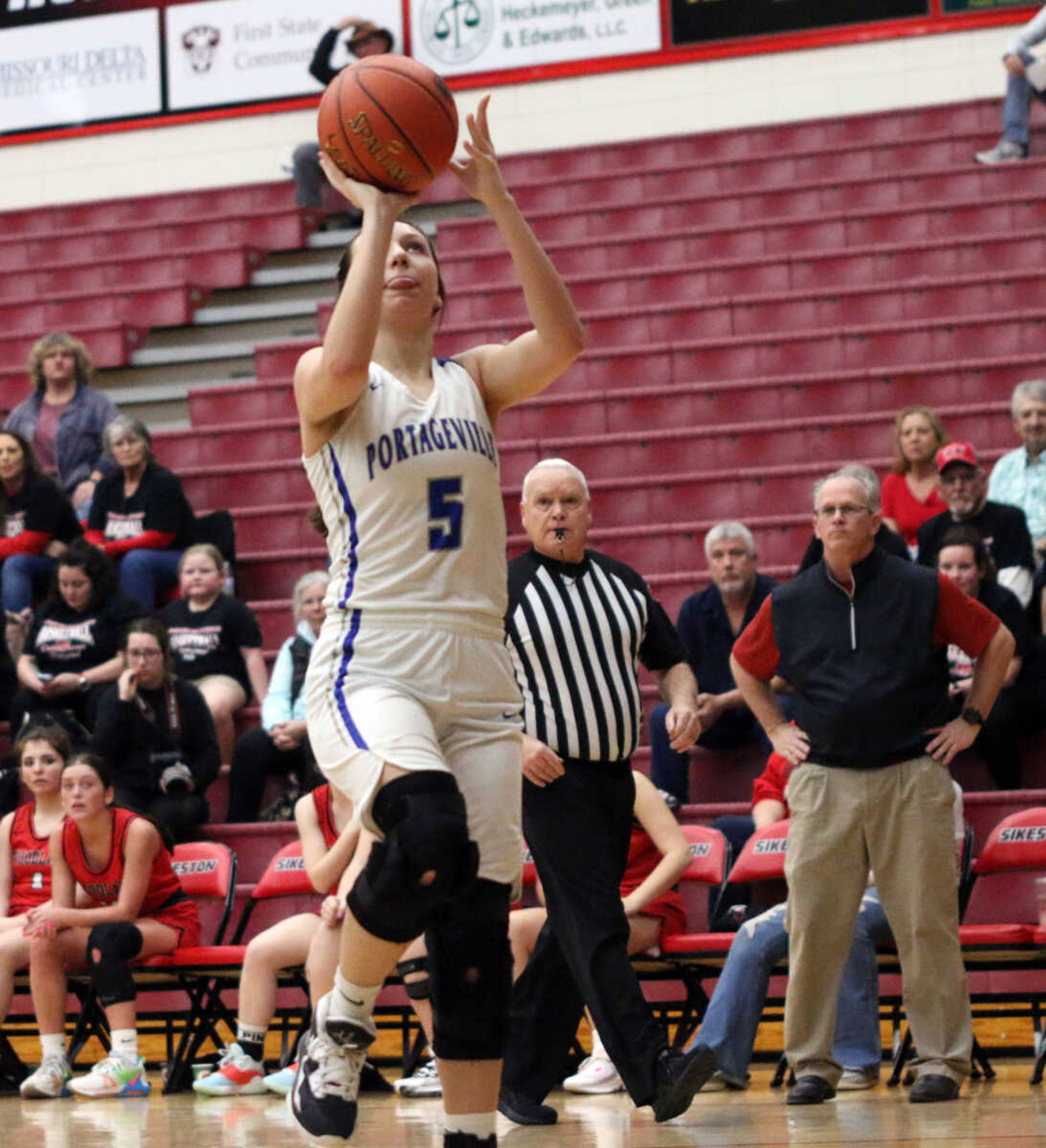 Portageville's Laney Stone (5) shoots&nbsp;during a 61-25 win over Woodland in a MSHSAA Class 3 Sectional at the Sikeston Fieldhouse on Monday, Feb. 28. (Dennis Marshall/Standard-Democrat)