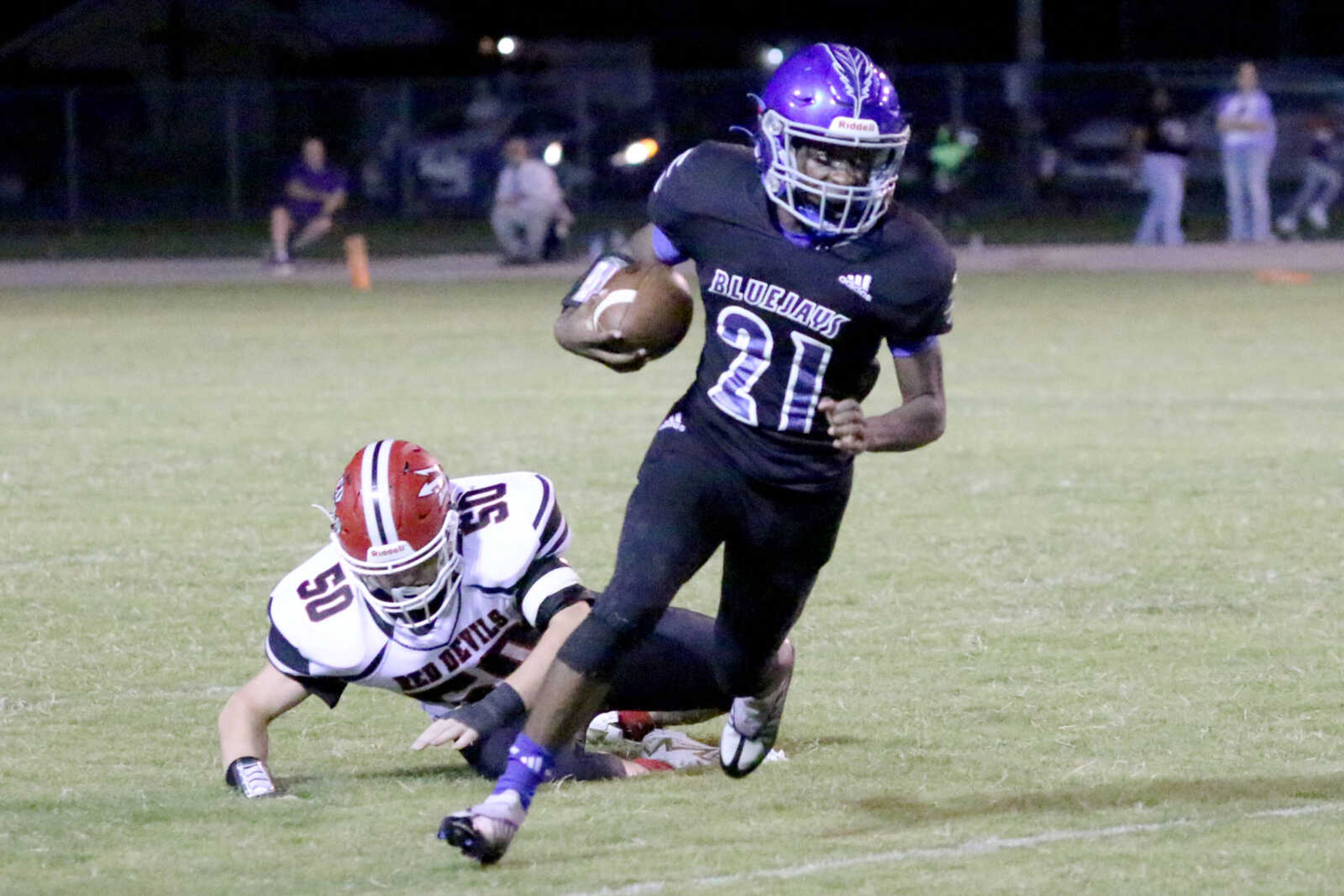 Charleston's J'Maurion Robinson (21) runs&nbsp;during a 14-12 loss to Chaffee at John Harris Marshall Stadium on Thursday, August 31, 2023.&nbsp;