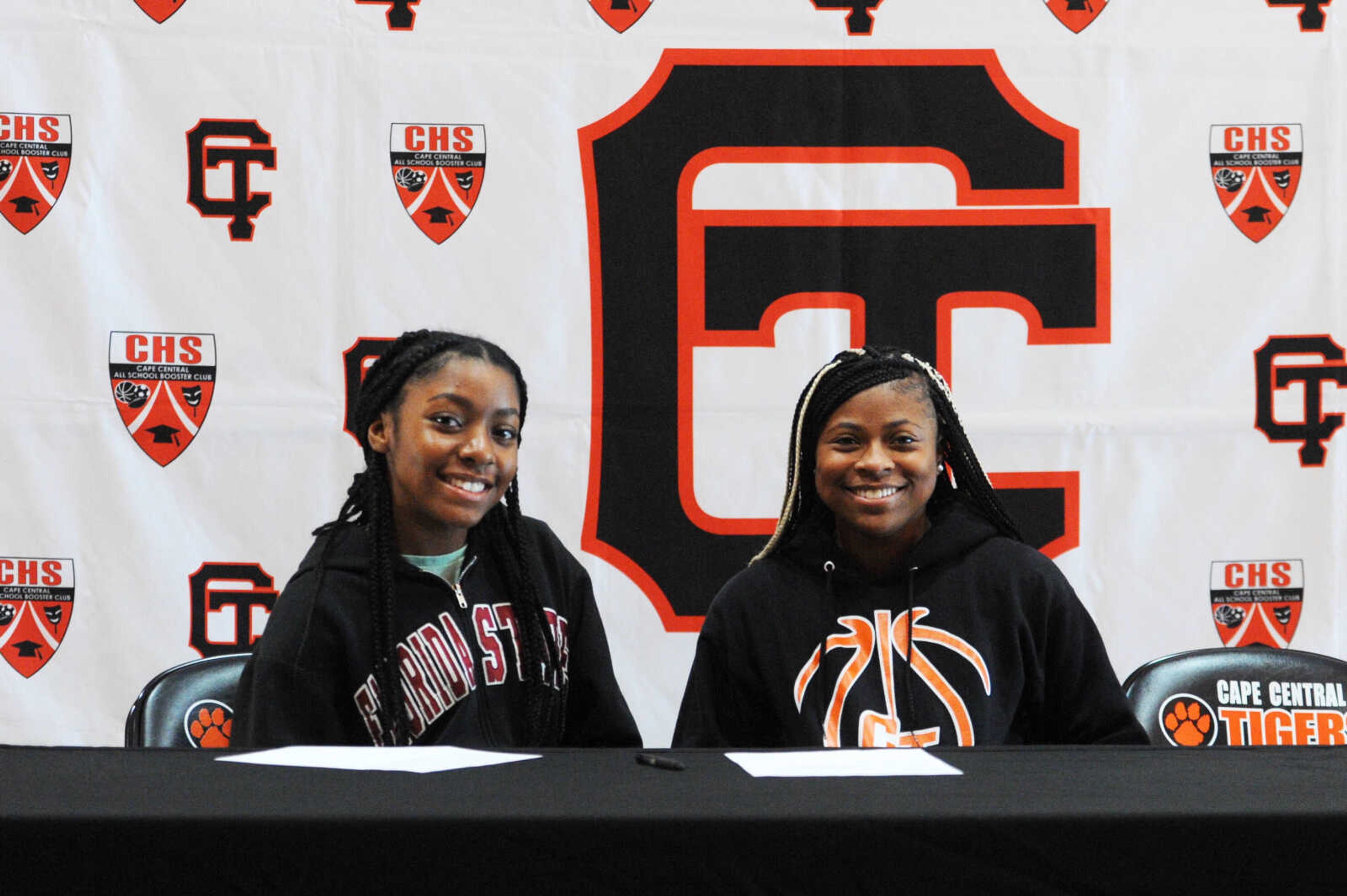 Cape Central's Keri Williams and Ki Bogan pose for a photo after signing letters of intent to play softball at Mineral Area College on Thursday at Cape Central High School.