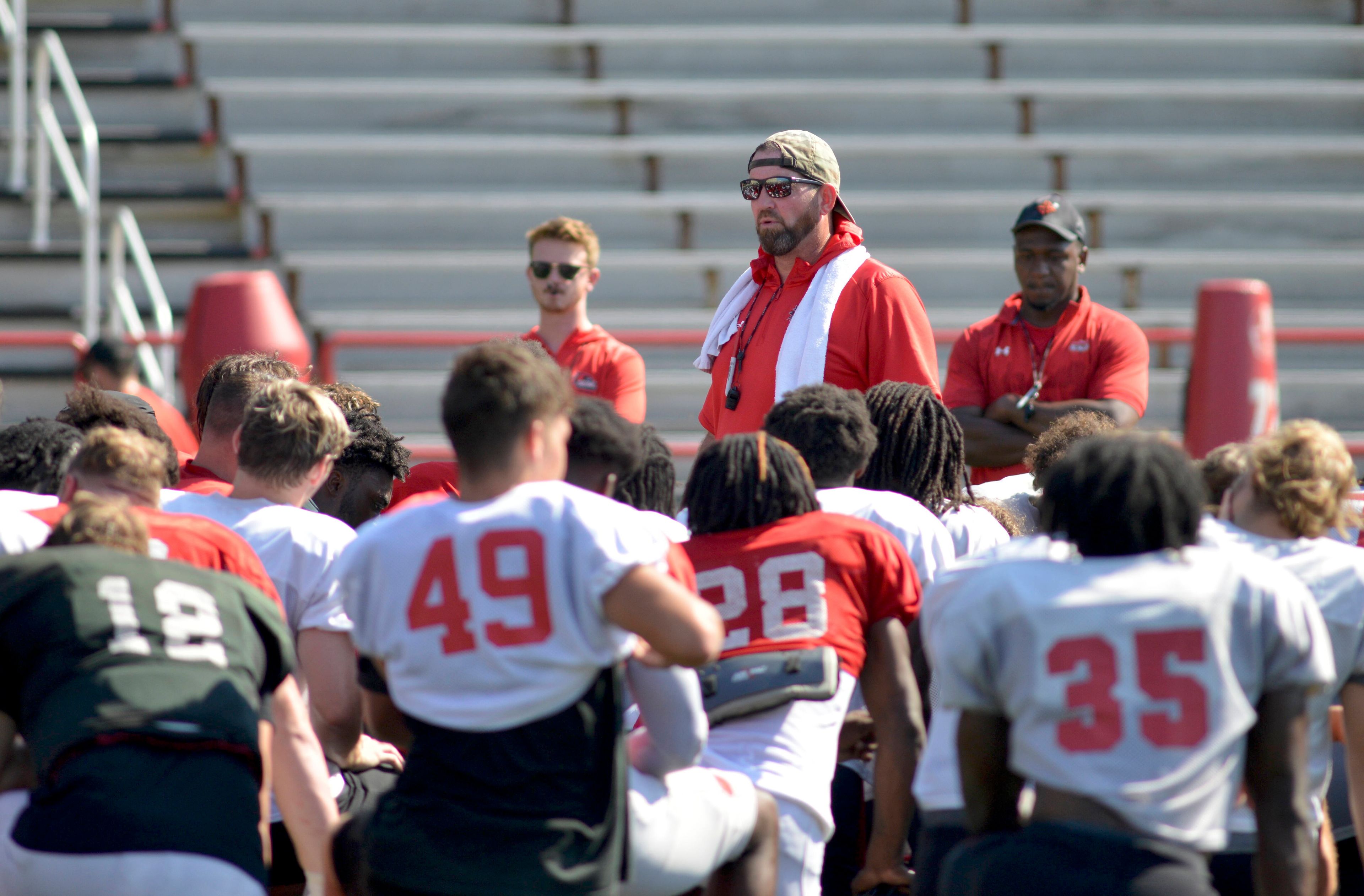 Southeast Missouri State head coach Tom Matukewicz addresses his players after a recent fall camp practice at Houck Field.
