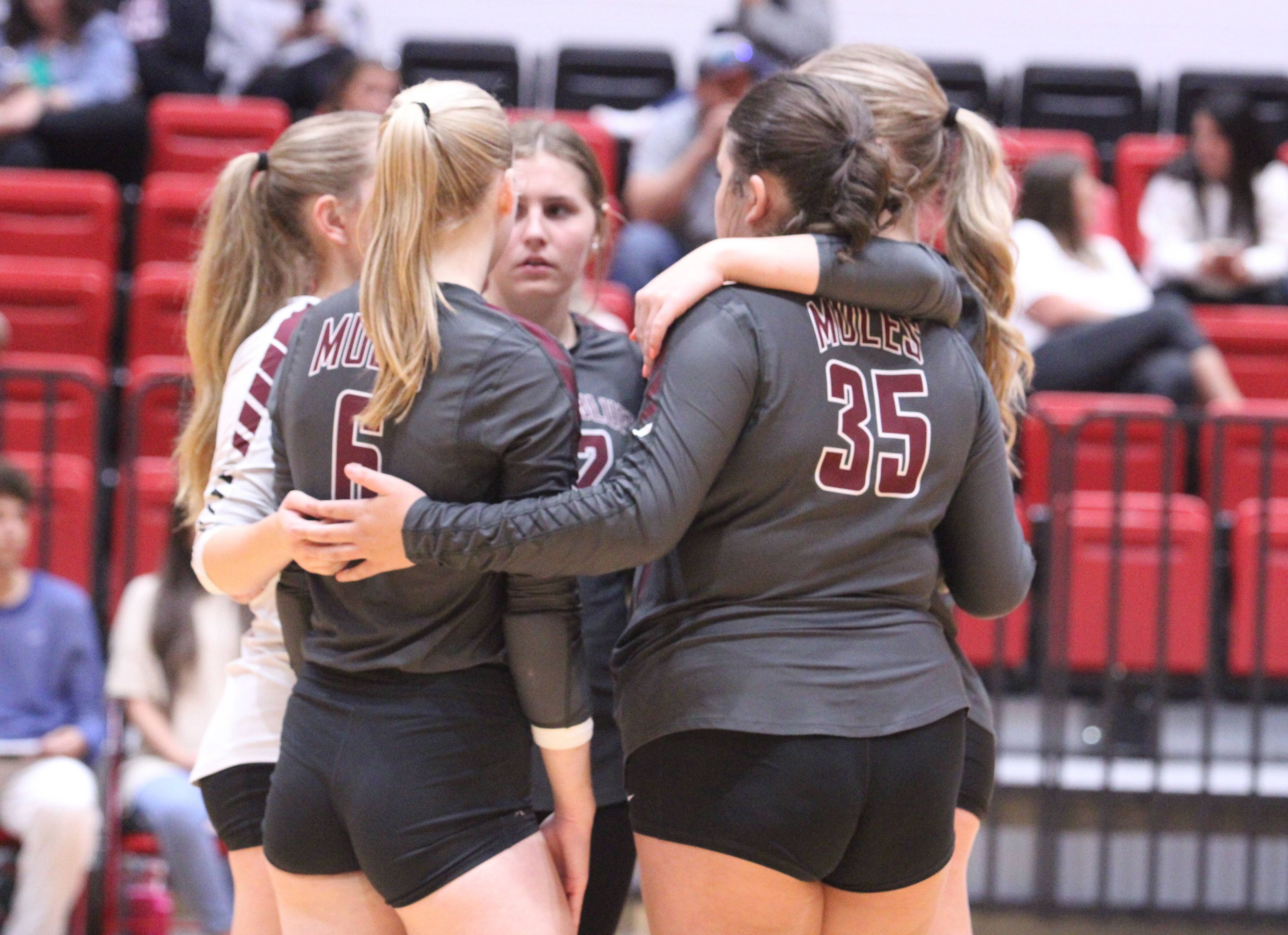 Poplar Bluff huddles after conceding a point to the Indians during the Tuesday, September 10 match between Jackson and Poplar Bluff at Jackson High School in Jackson, Mo. 