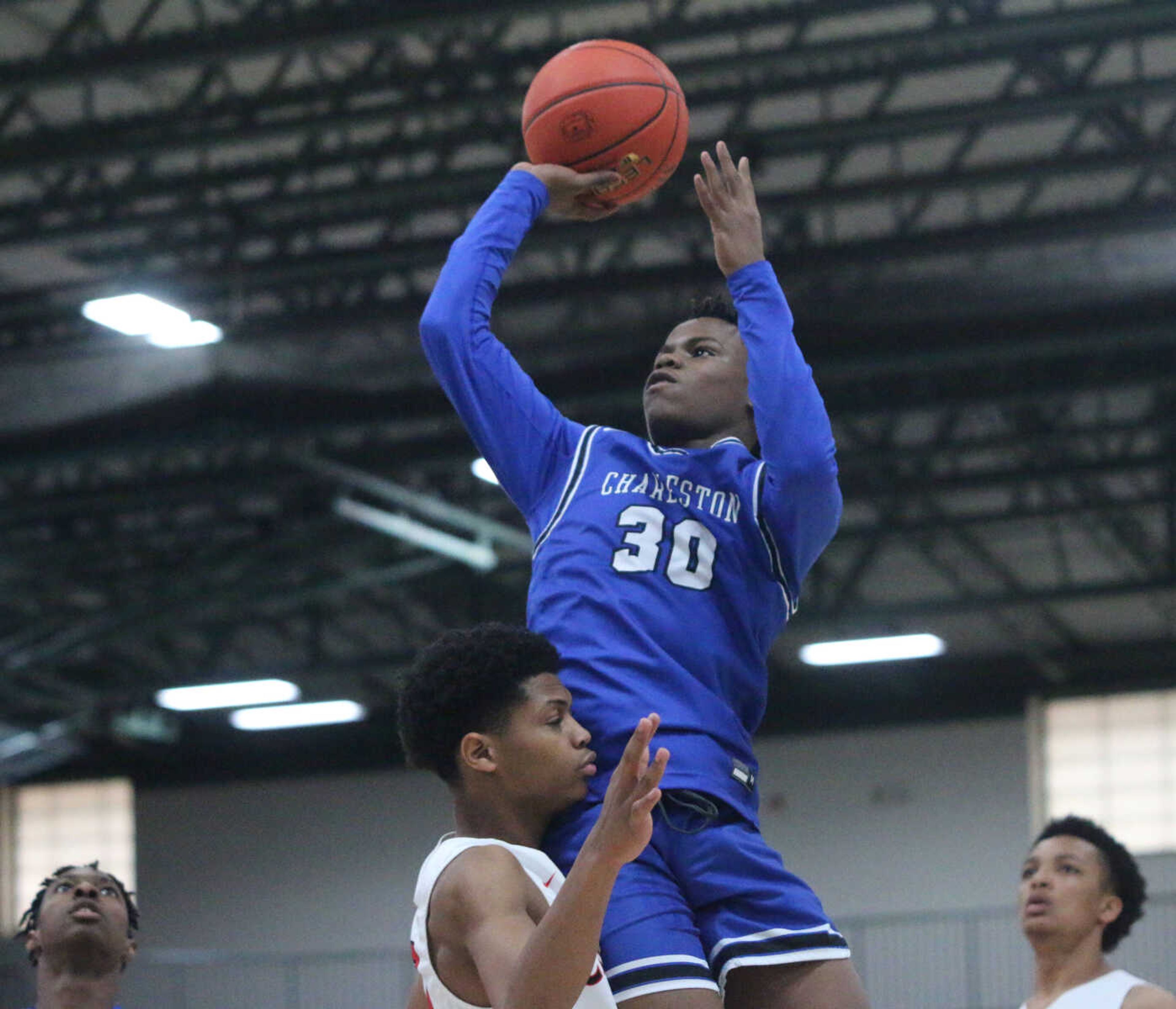 Larry Horton goes up over a defender during Charleston's 74-61 win over Bishop DuBourg in a Class 3 quarterfinal at the Farmington Community Civic Center on Saturday, March 5. (Dennis Marshall/Standard-Democrat)