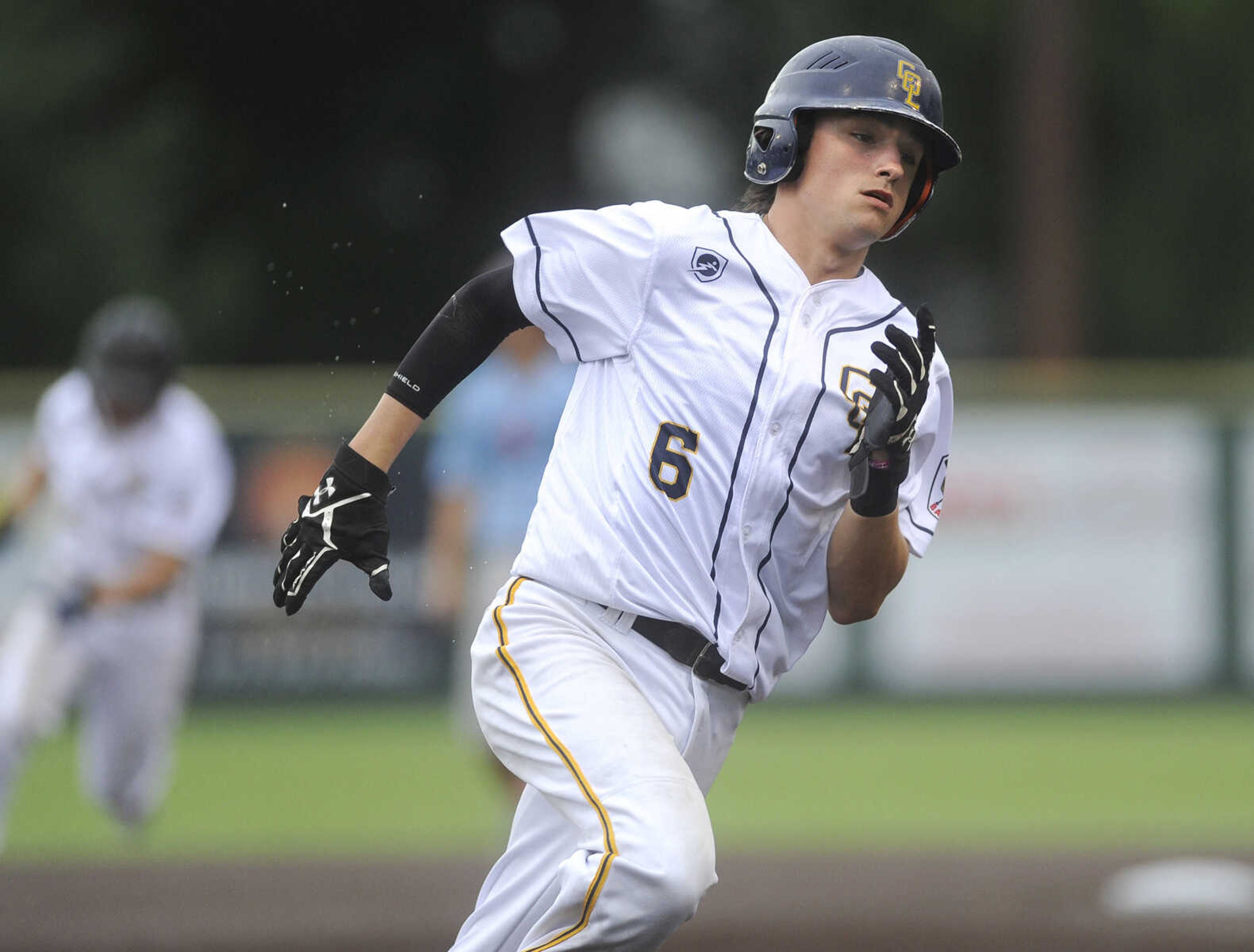 FRED LYNCH ~ flynch@semissourian.com
Cape Girardeau Senior Legion's Luke Marcum heads for home on a double by Trevor Haas against Pemiscot County during the third inning Tuesday, June 12, 2018 at Capaha Field.