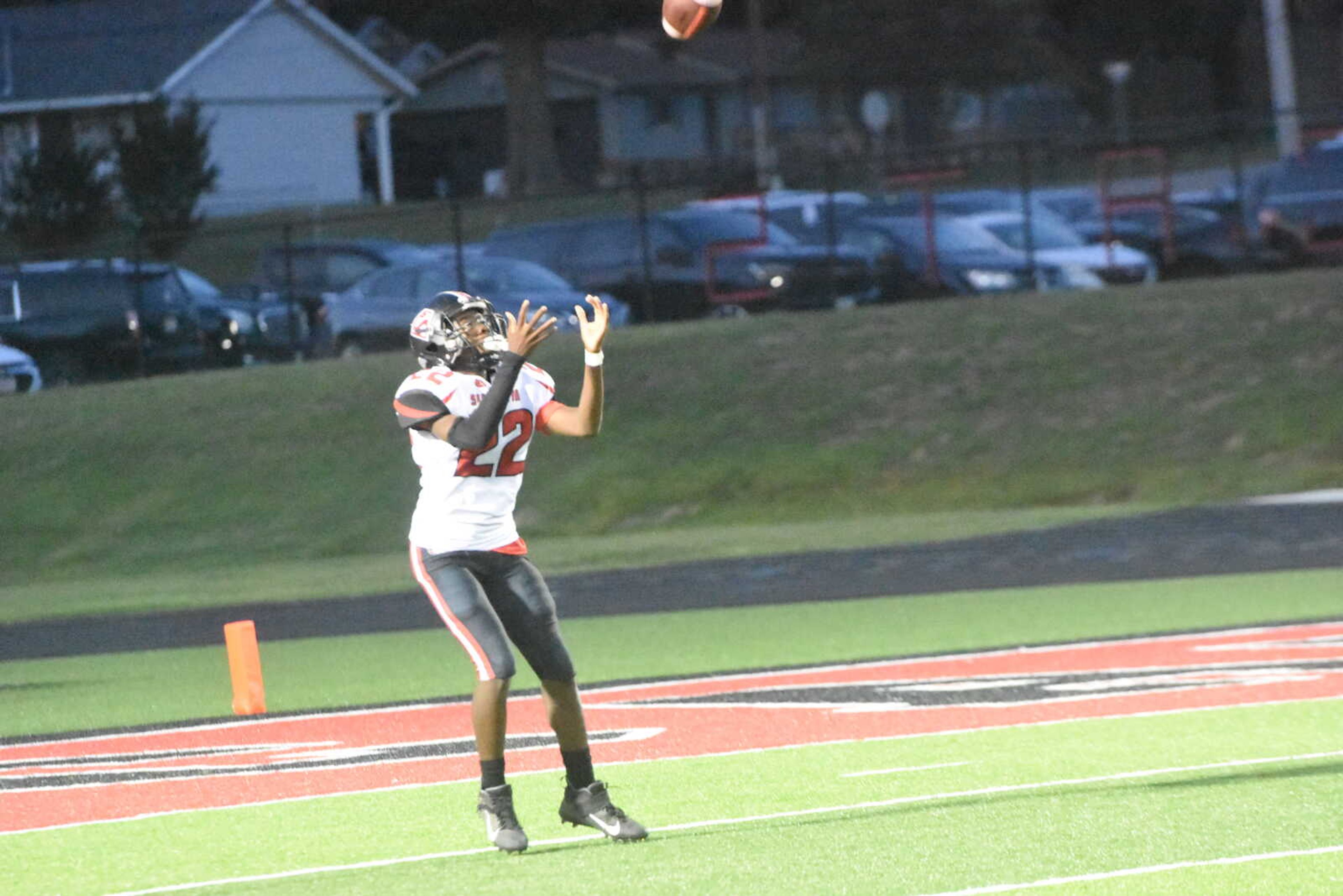 Sikeston's Keane Atkins field a kickoff Friday night.