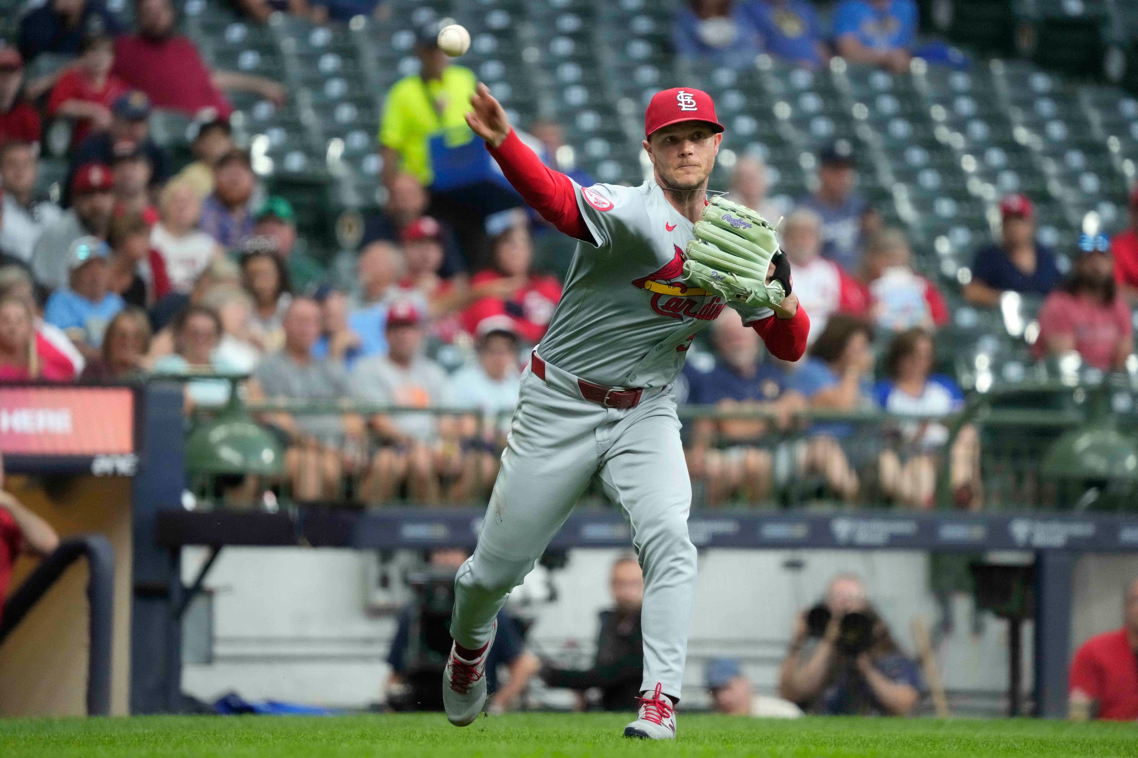 St. Louis Cardinals pitcher Sonny Gray throws to first for the out on a bunt by Milwaukee Brewers' Garrett Mitchell during the second inning of a baseball game Wednesday, Sept. 4, 2024, in Milwaukee. (AP Photo/Kayla Wolf)