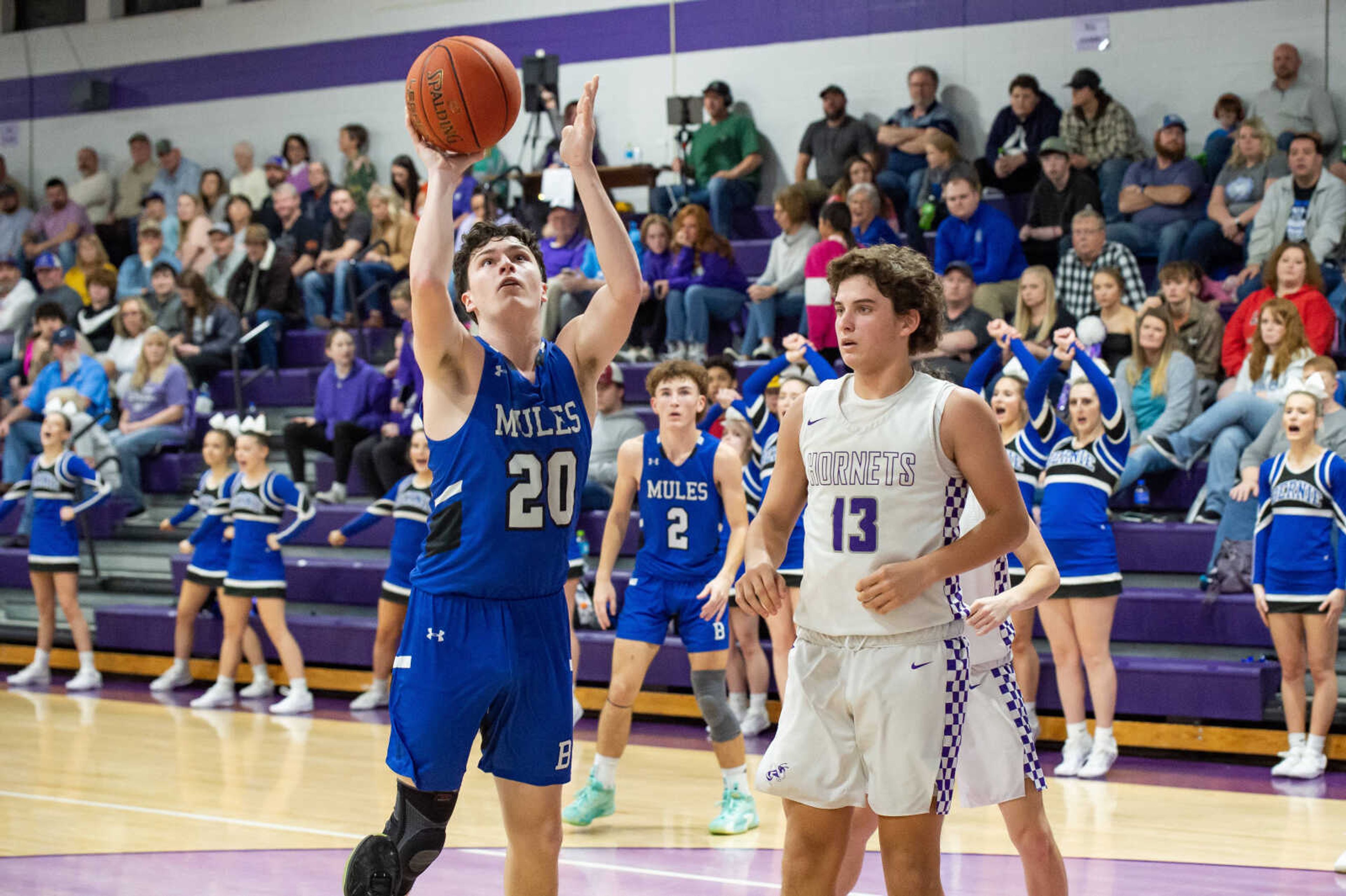 Bernie's Cade Arnold (20) takes a shot during a game at Holcomb Friday, Feb. 2, 2024.