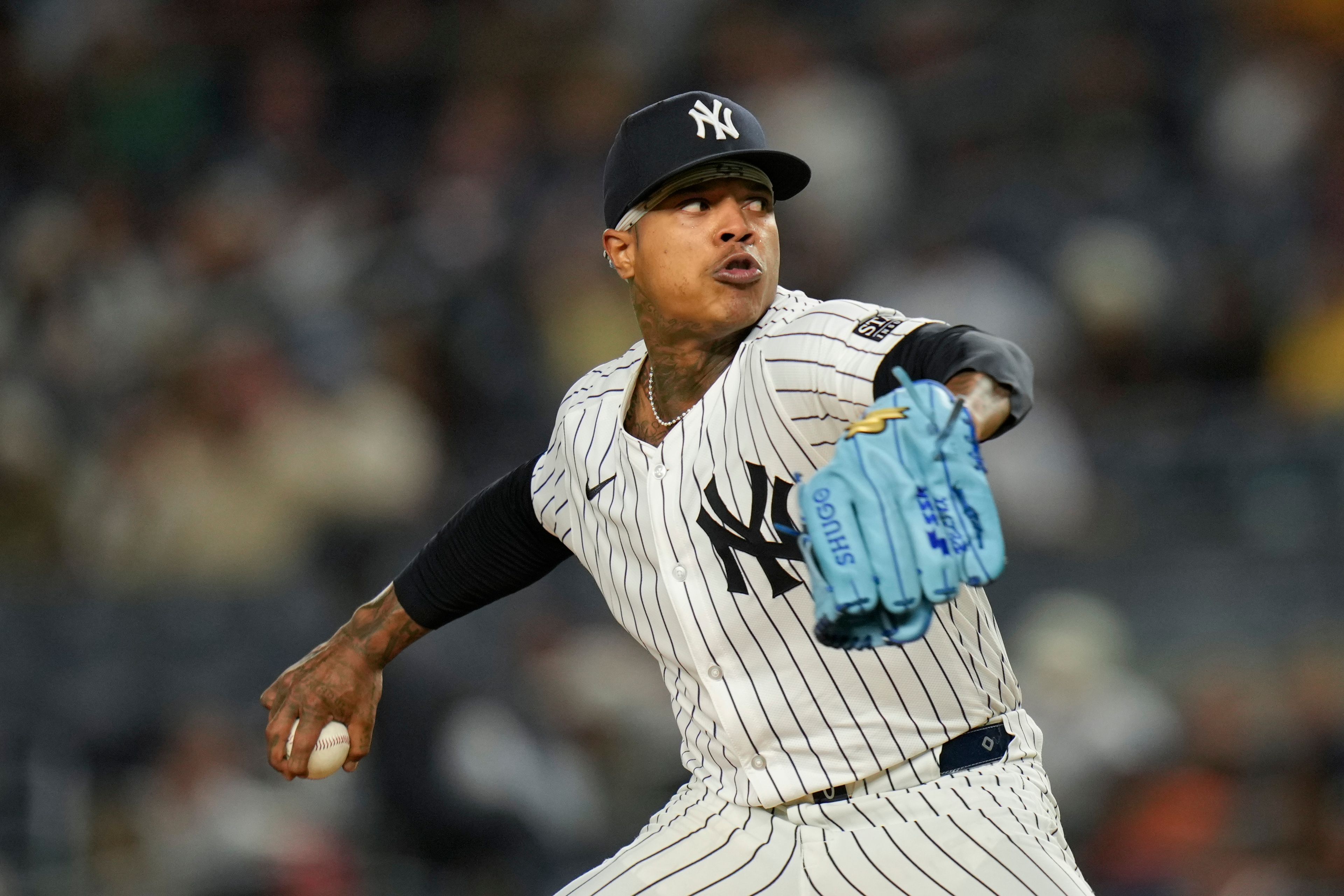 New York Yankees pitcher Marcus Stroman throws during the second inning of a baseball game against the Kansas City Royals at Yankee Stadium, Tuesday, Sept. 10, 2024, in New York. (AP Photo/Seth Wenig)