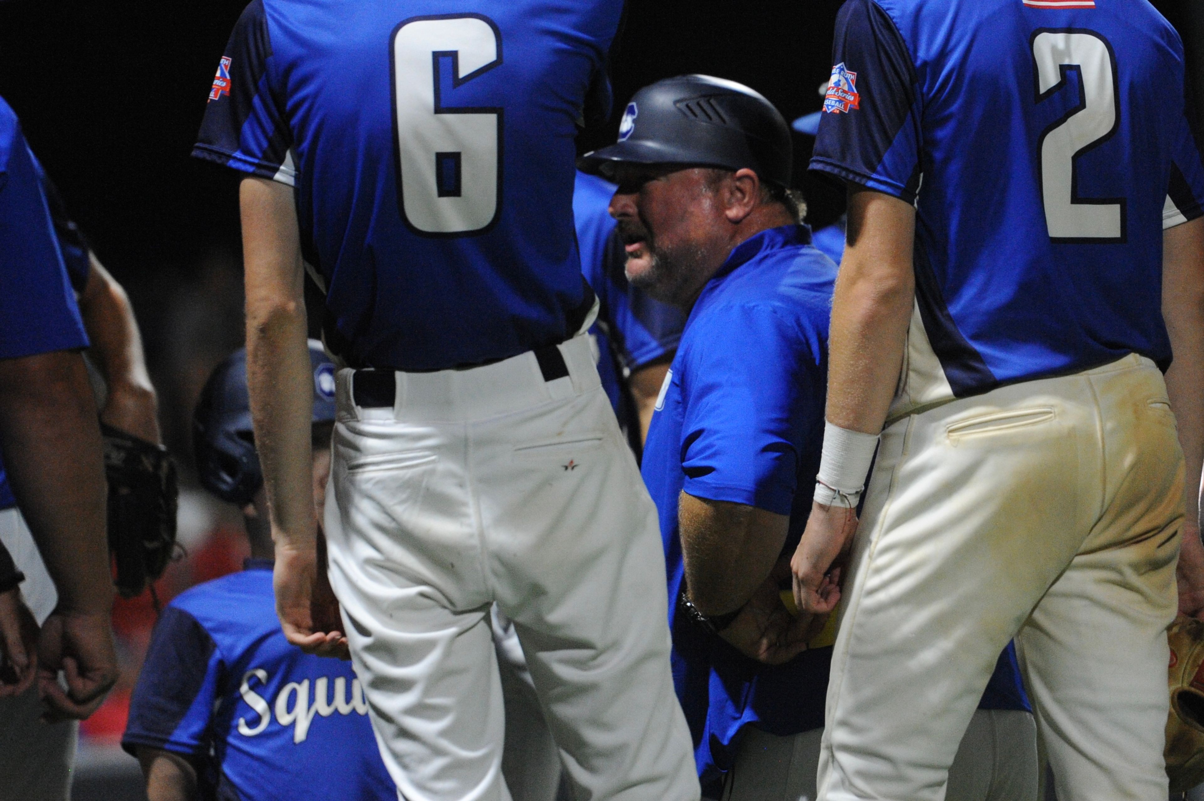 Aycorp coach Michael Minner talks to the team during a Saturday, August 10, 2024 Babe Ruth World Series game between the Aycorp Fighting Squirrels and Manassas, Virginia, at Capaha Field in Cape Girardeau, Mo. Aycorp defeated Manassas, 3-1.