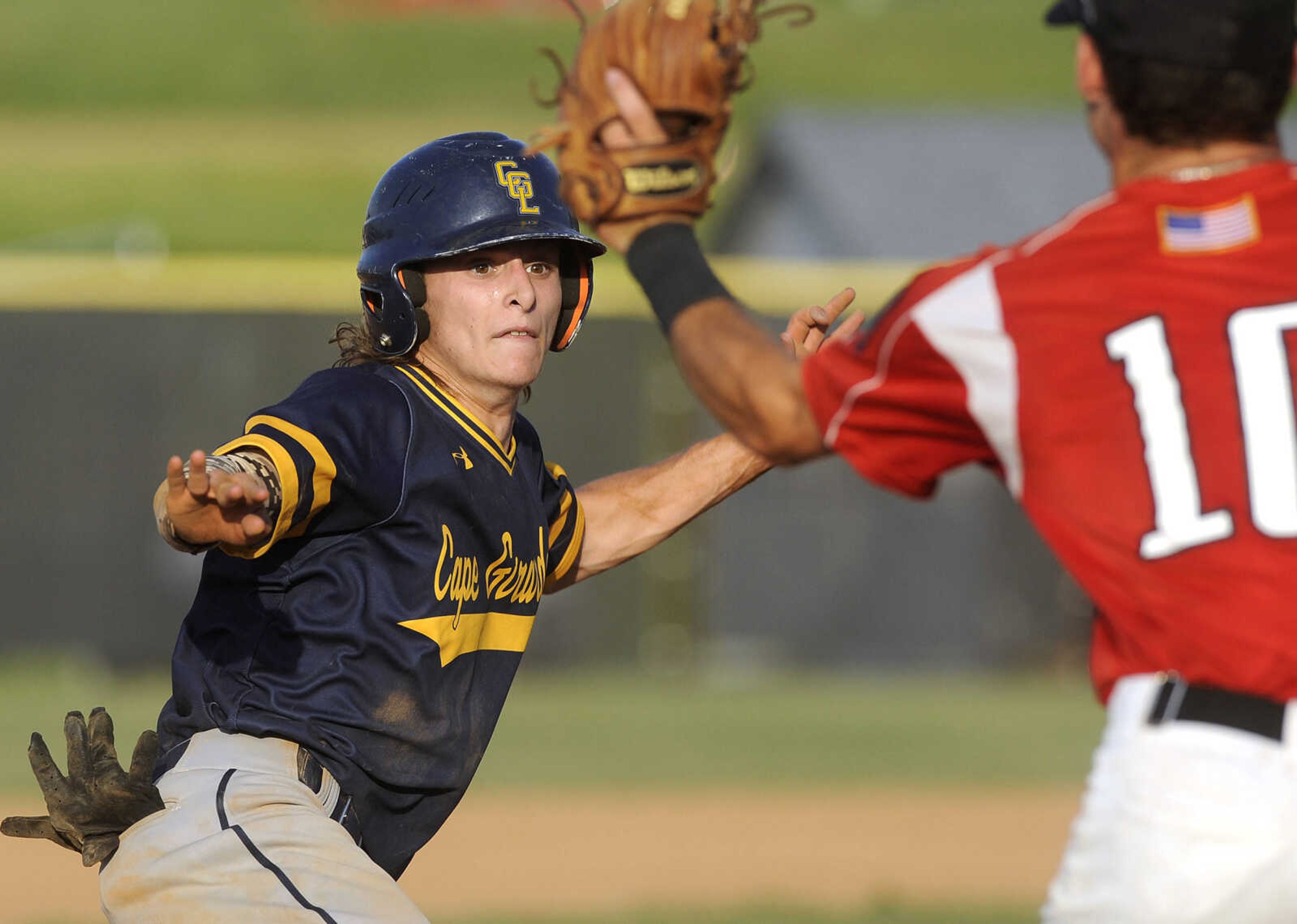 FRED LYNCH ~ flynch@semissourian.com
Cape Girardeau Post 63 Senior Legion's Ben Womack stops in his tracks before Jackson Senior Legion third baseman tags him out in a rundown during the fourth inning Thursday, June 7, 2018 in Jackson.