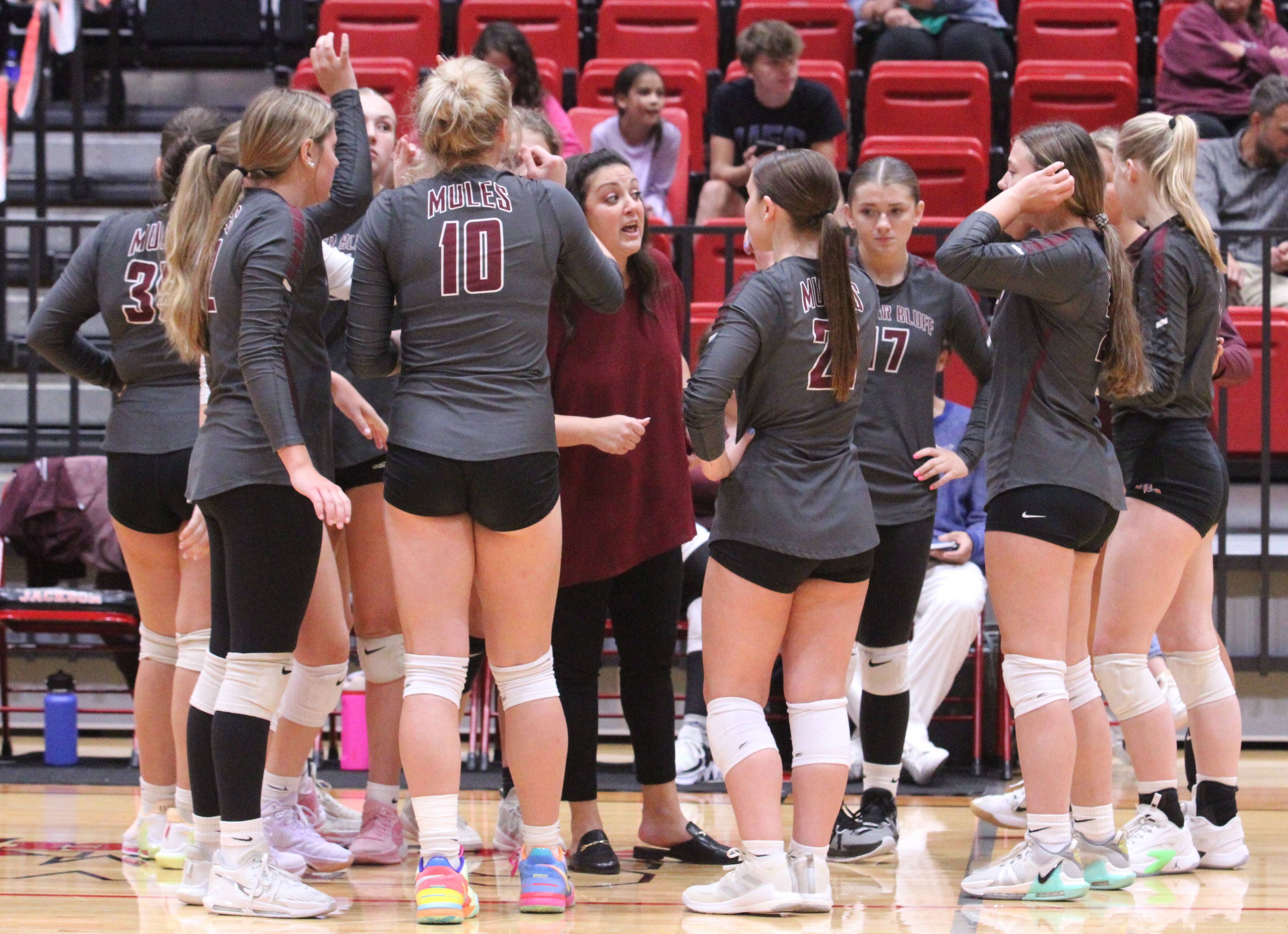 Mules head coach Adriann D'Amico talks to her team during the Tuesday, September 10 match between Jackson and Poplar Bluff at Jackson High School in Jackson, Mo. 