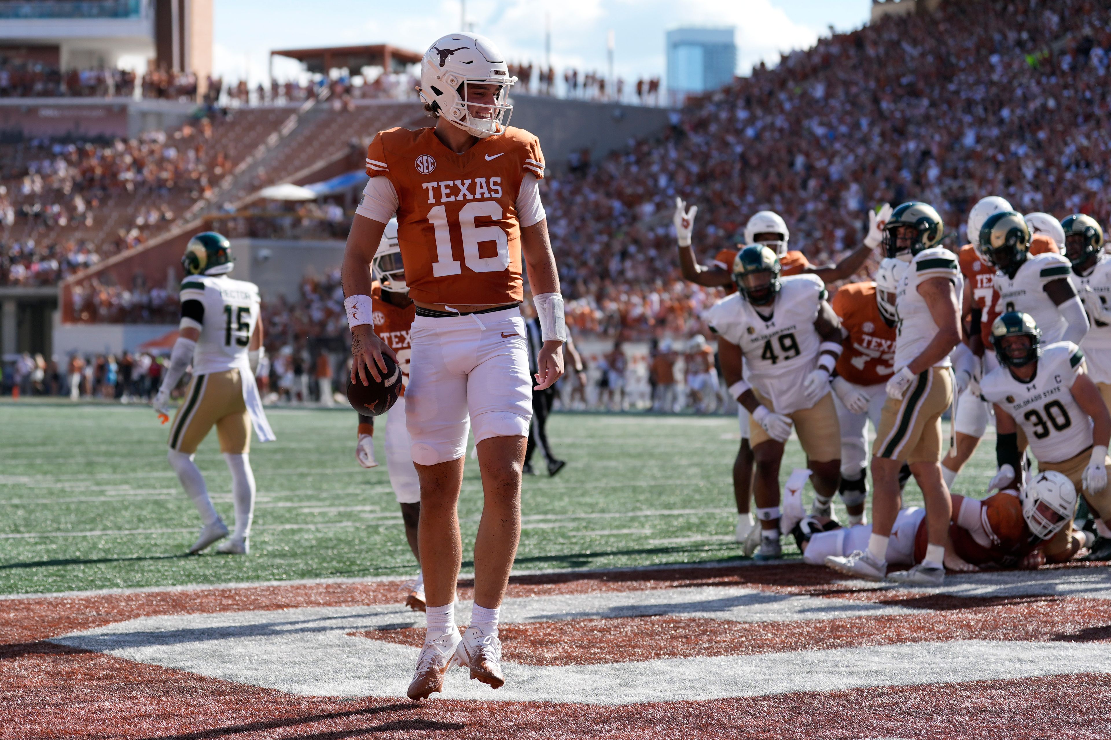 Texas quarterback Arch Manning (16) celebrates after scoring a touchdown against Colorado State during the second half of an NCAA college football game in Austin, Texas, Saturday, Aug. 31, 2024. (AP Photo/Eric Gay)