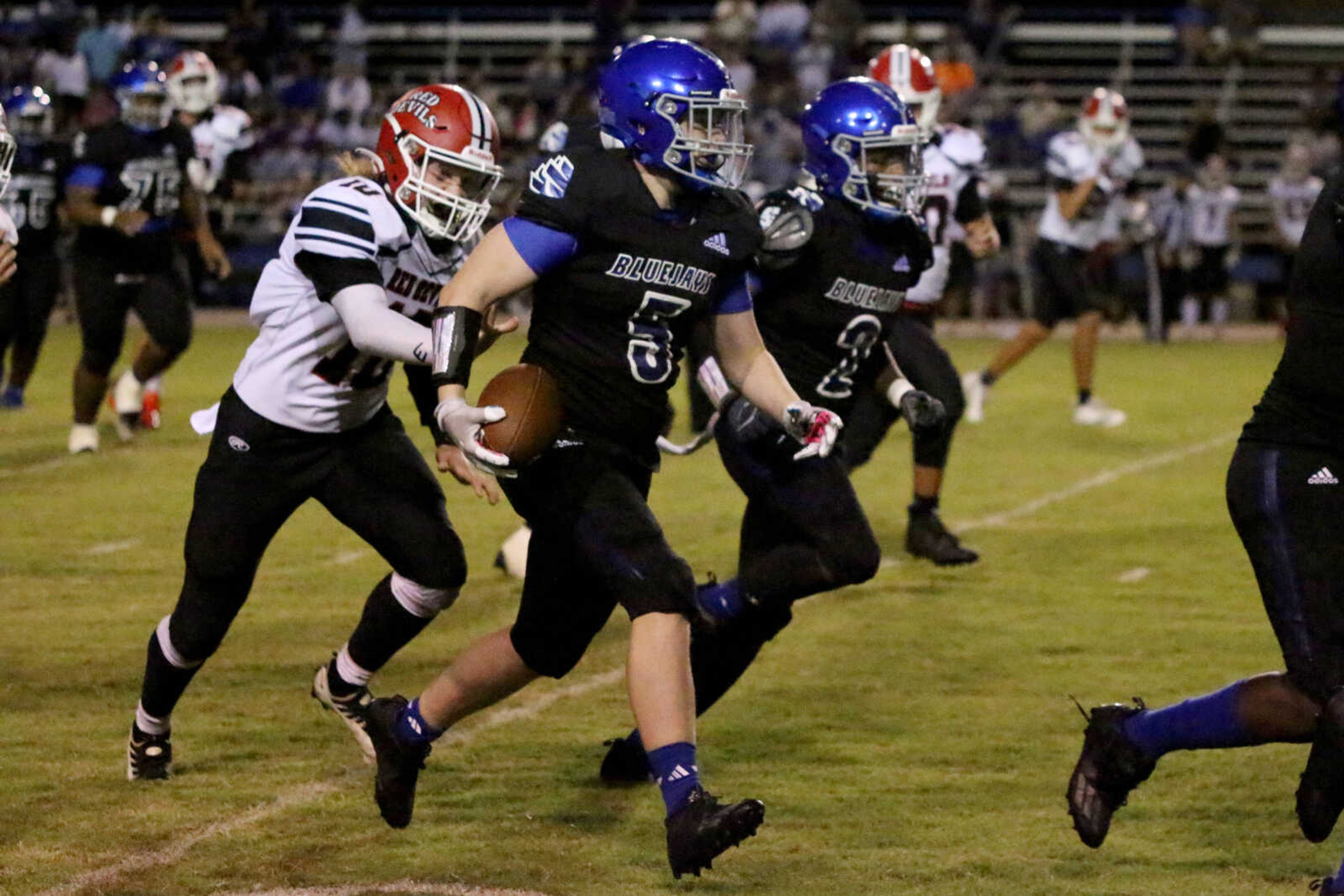 Charleston's Kaden Branam (5) runs&nbsp;during a 14-12 loss to Chaffee at John Harris Marshall Stadium on Thursday, August 31, 2023.&nbsp;