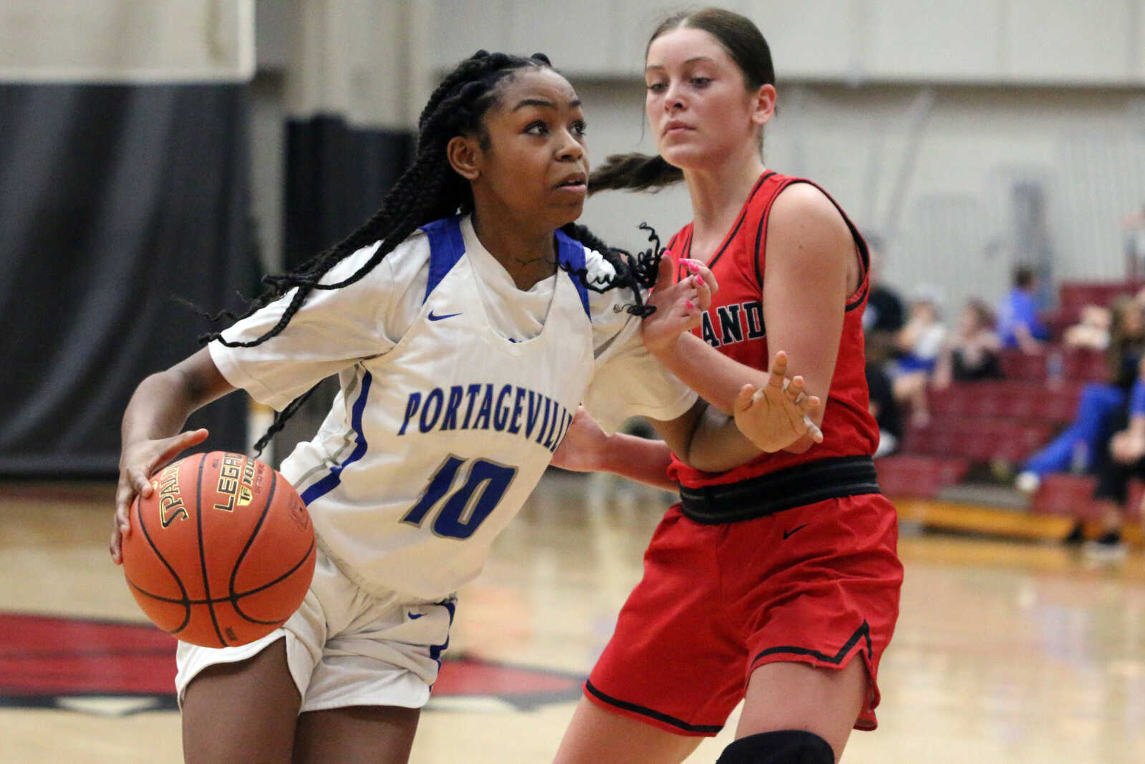 Portageville's Glo Farmer (10) drives&nbsp;during a 61-25 win over Woodland in a MSHSAA Class 3 Sectional at the Sikeston Fieldhouse on Monday, Feb. 28. (Dennis Marshall/Standard-Democrat)