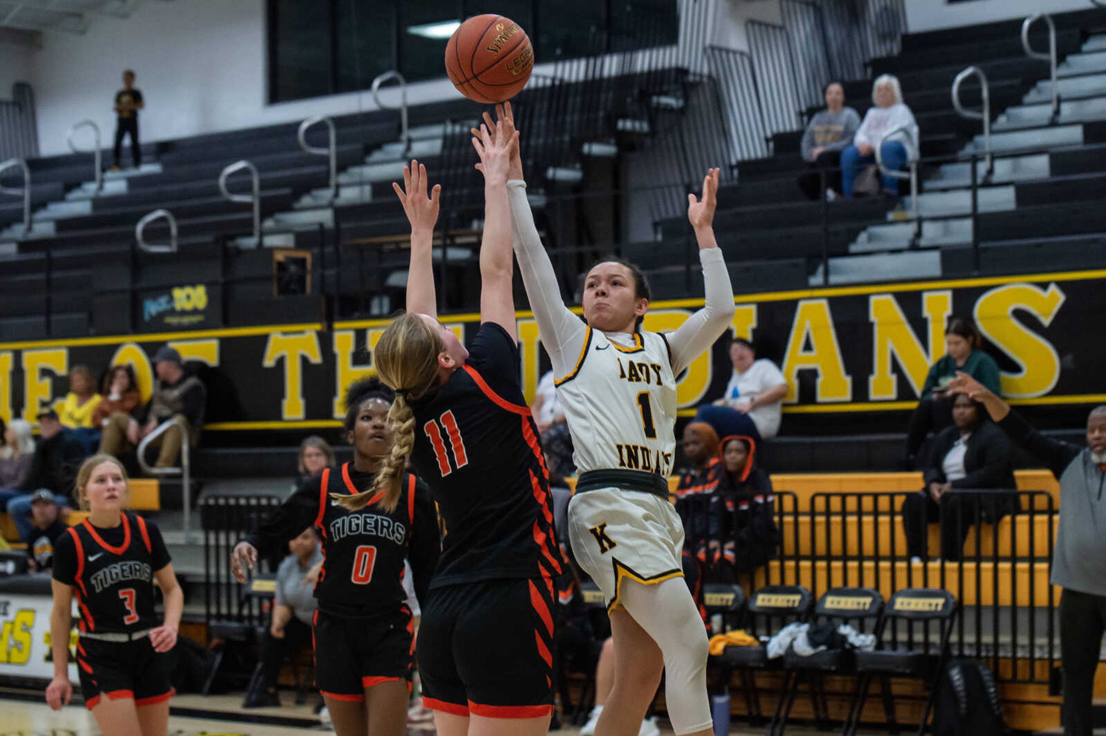 Kennett freshman Alyce Edwards fires off a contested shot during a home game against Cape Central Monday, Feb. 5.