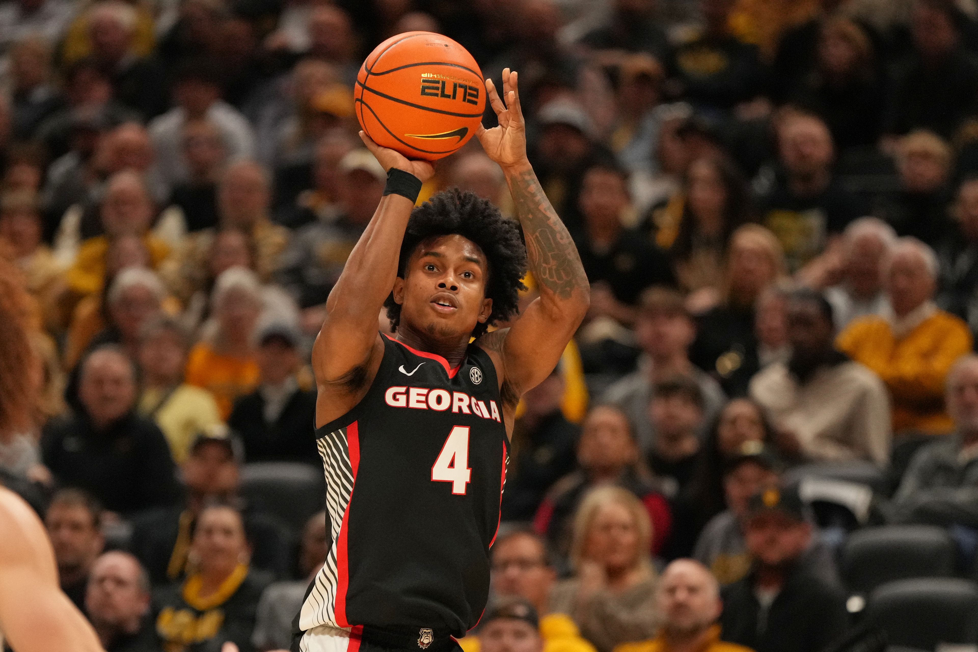 Millender's three-point play in final seconds lifts No. 21 Georgia past Missouri 74-72