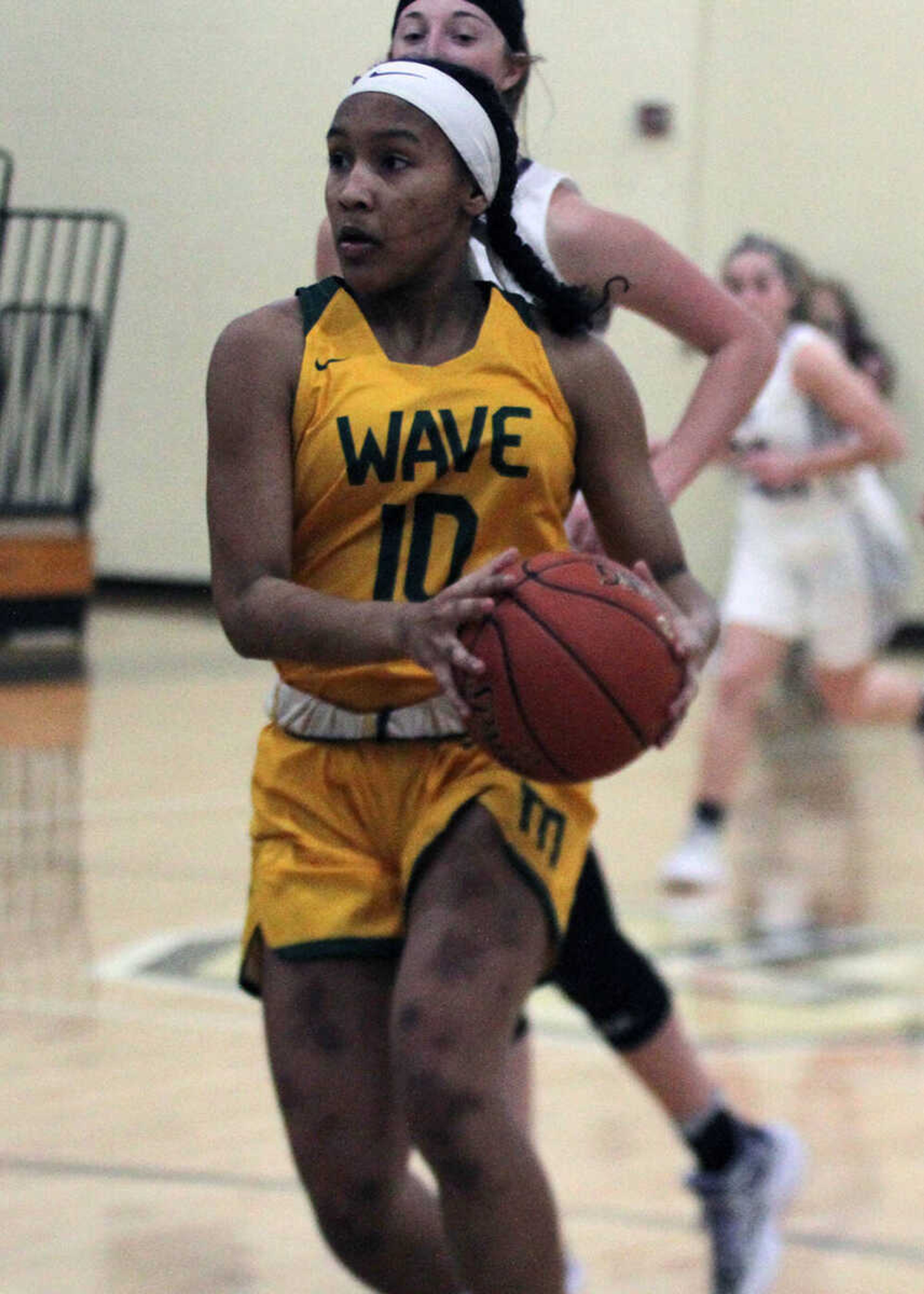 Malden's Antwanasia Bloniarz-Smoot drives to the basket in a semifinal of the Bootheel Conference varsity girls basketball tournament last season at Campbell High School.