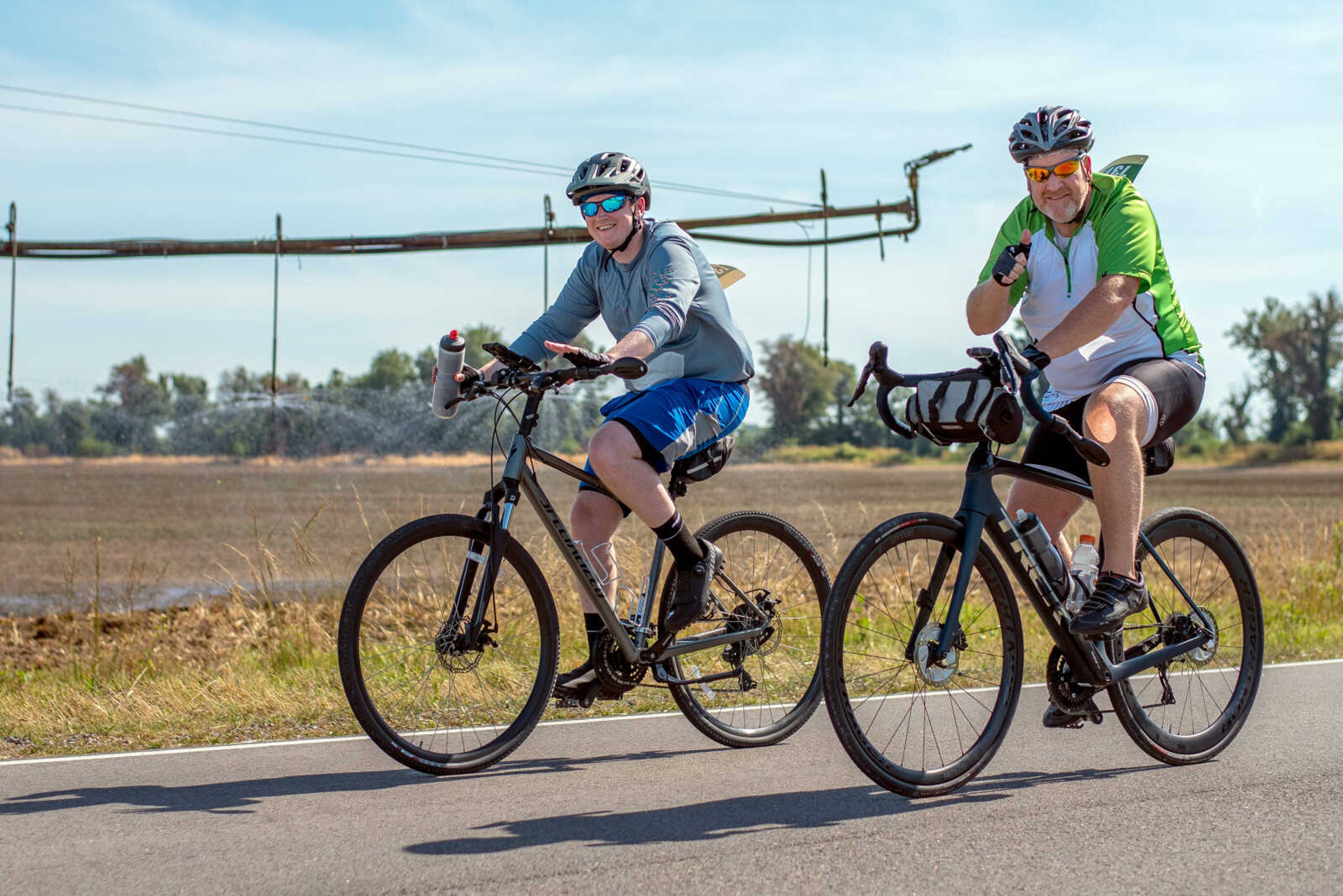 Tour de Corn participants ride along the 33-mile route along farm roads and country highways outside East Prairie, Mo., Saturday, June 25.