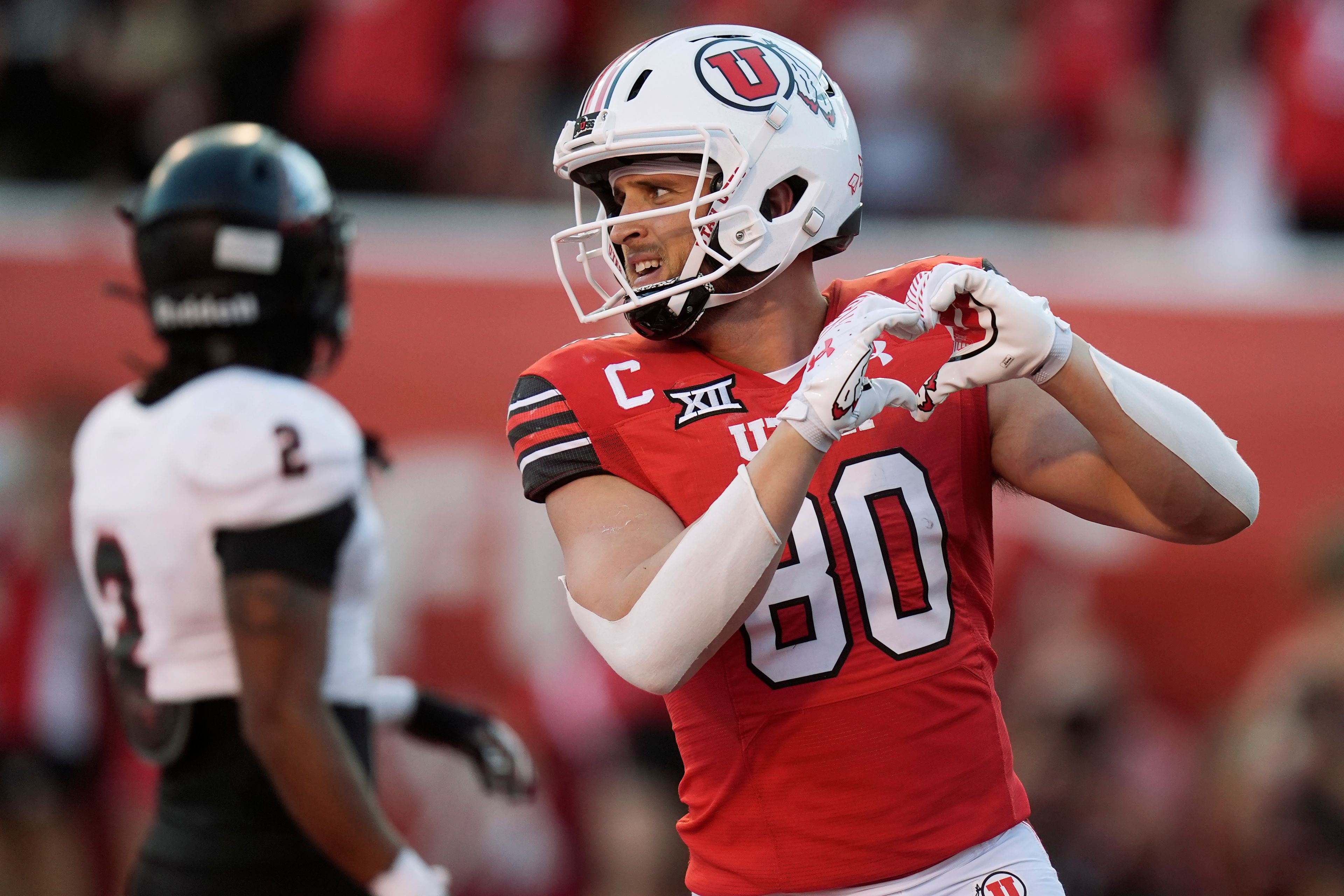 Utah tight end Brant Kuithe (80) celebrates after scoring against Southern Utah in the first half of an NCAA college football game Thursday, Aug. 29, 2024, in Salt Lake City. (AP Photo/Rick Bowmer)