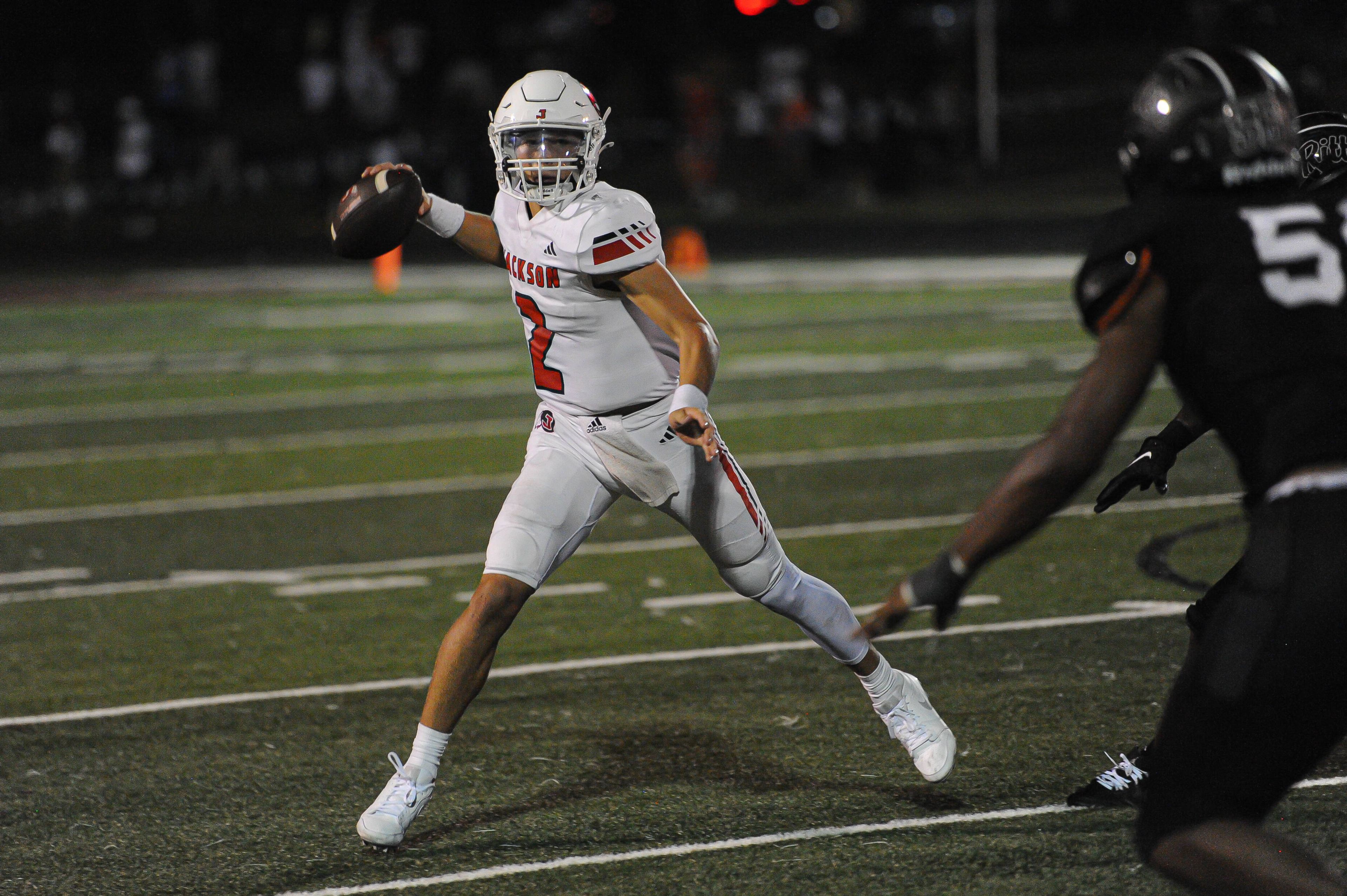 Jackson's Drew Parsons winds to throw during a Friday, August 30, 2024 game between the Cardinal Ritter College Prep Lions and the Jackson Indians at Cardinal Ritter College Prep High School in St. Louis. Cardinal Ritter defeated Jackson, 44-7.