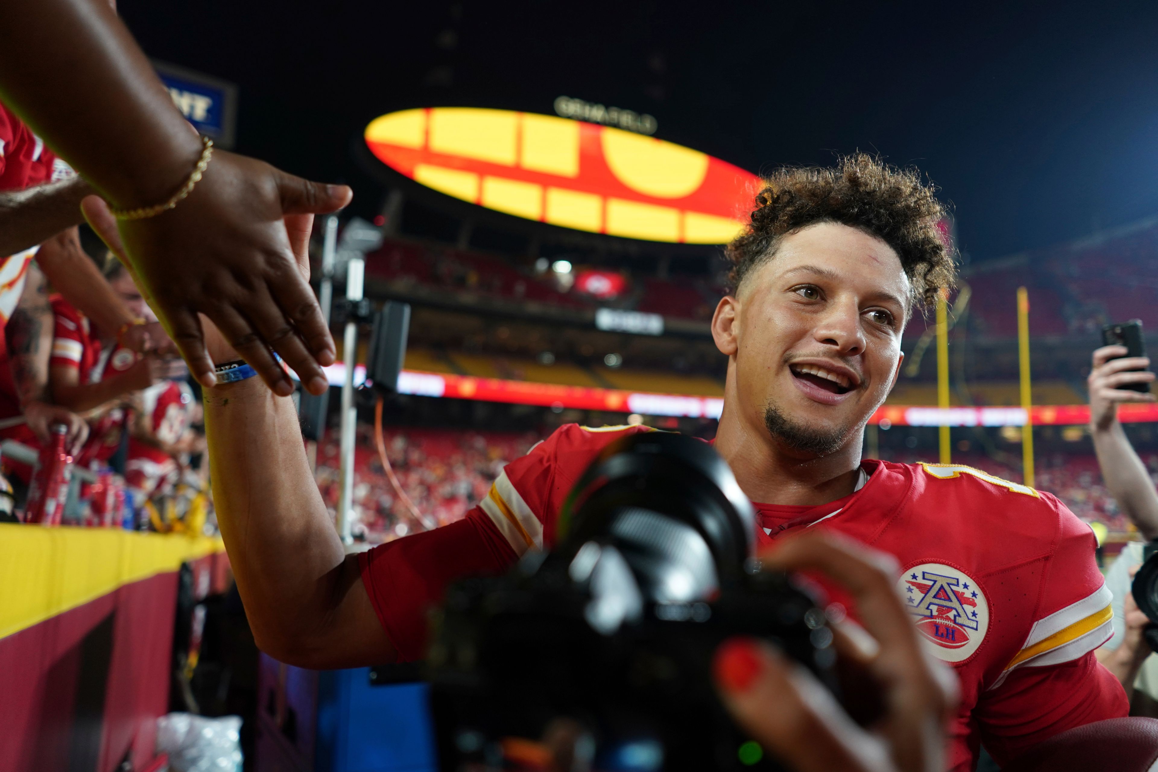 Kansas City Chiefs quarterback Patrick Mahomes celebrates as he heads off the field following an NFL football game against the Baltimore Ravens Thursday, Sept. 5, 2024, in Kansas City, Mo. The Chiefs won 27-20. (AP Photo/Ed Zurga)