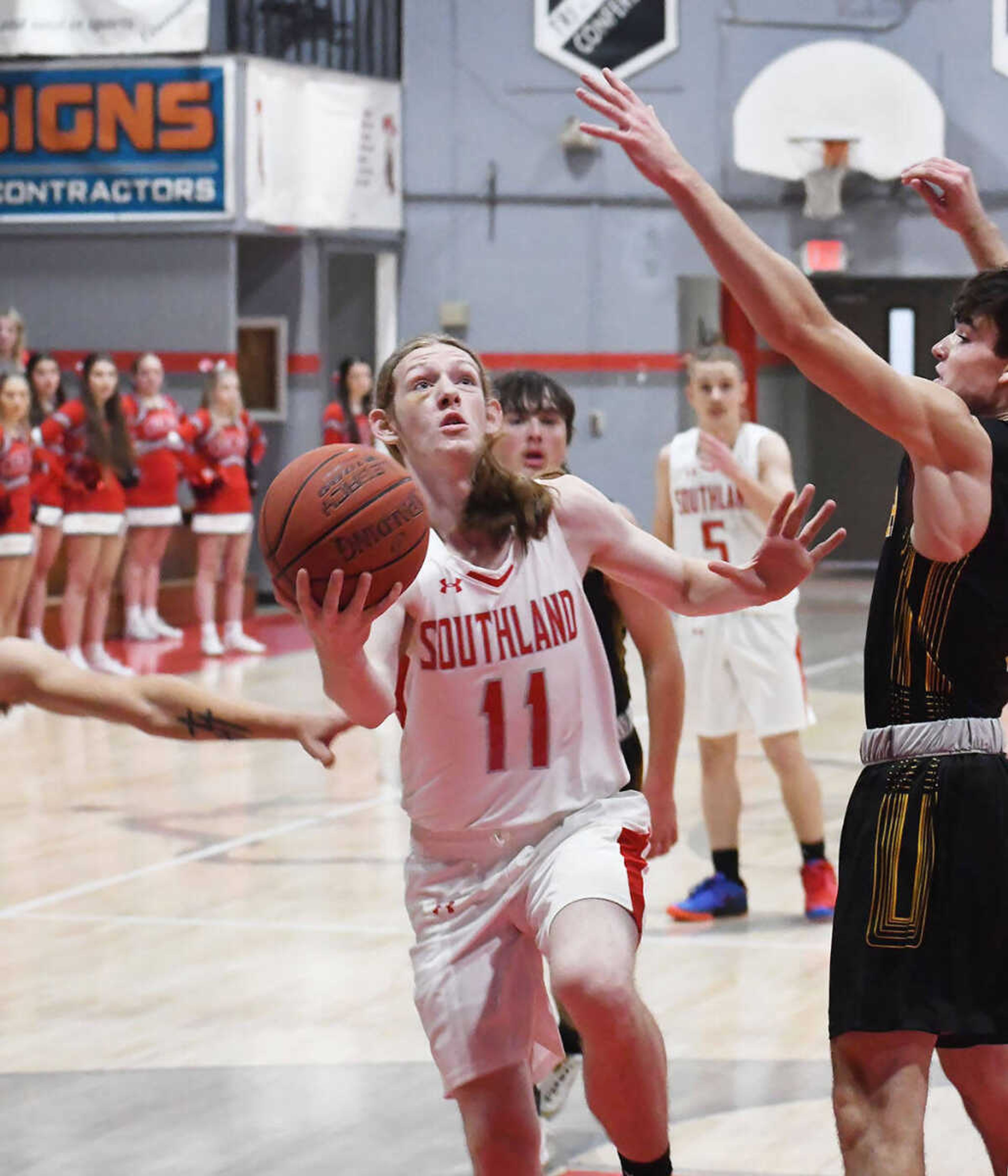 Southland’s Elijah Finkbeiner (11) attempts a scoop shot during a scrimmage versus Cooter in Cardwell dated Tuesday, Nov. 14.