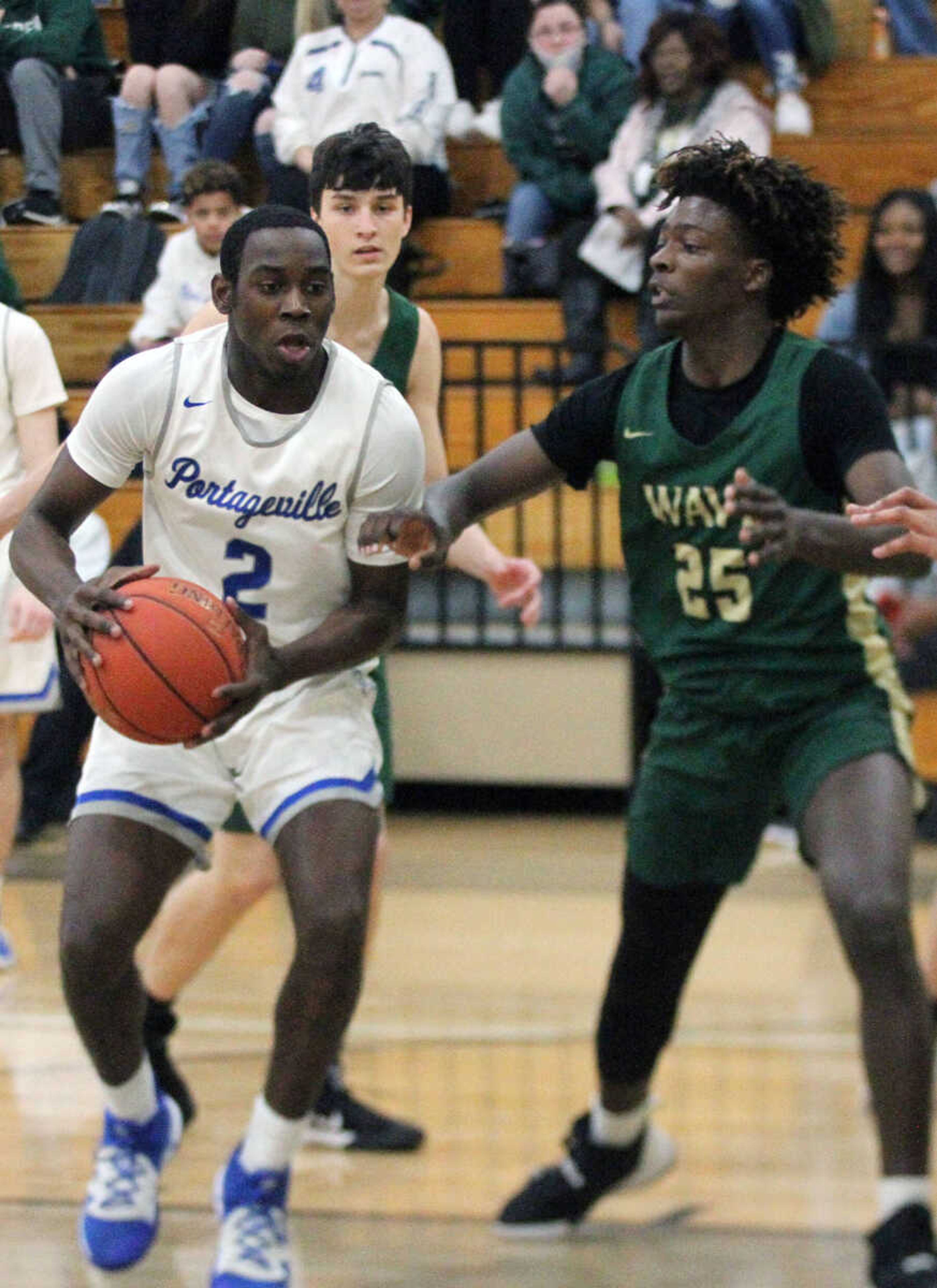 Portageville's Jabryson Rand penetrates against Malden's D'Angelo Austin in a quarterfinal of the Bootheel Conference varsity boys basketball tournament last season at Campbell High School. 