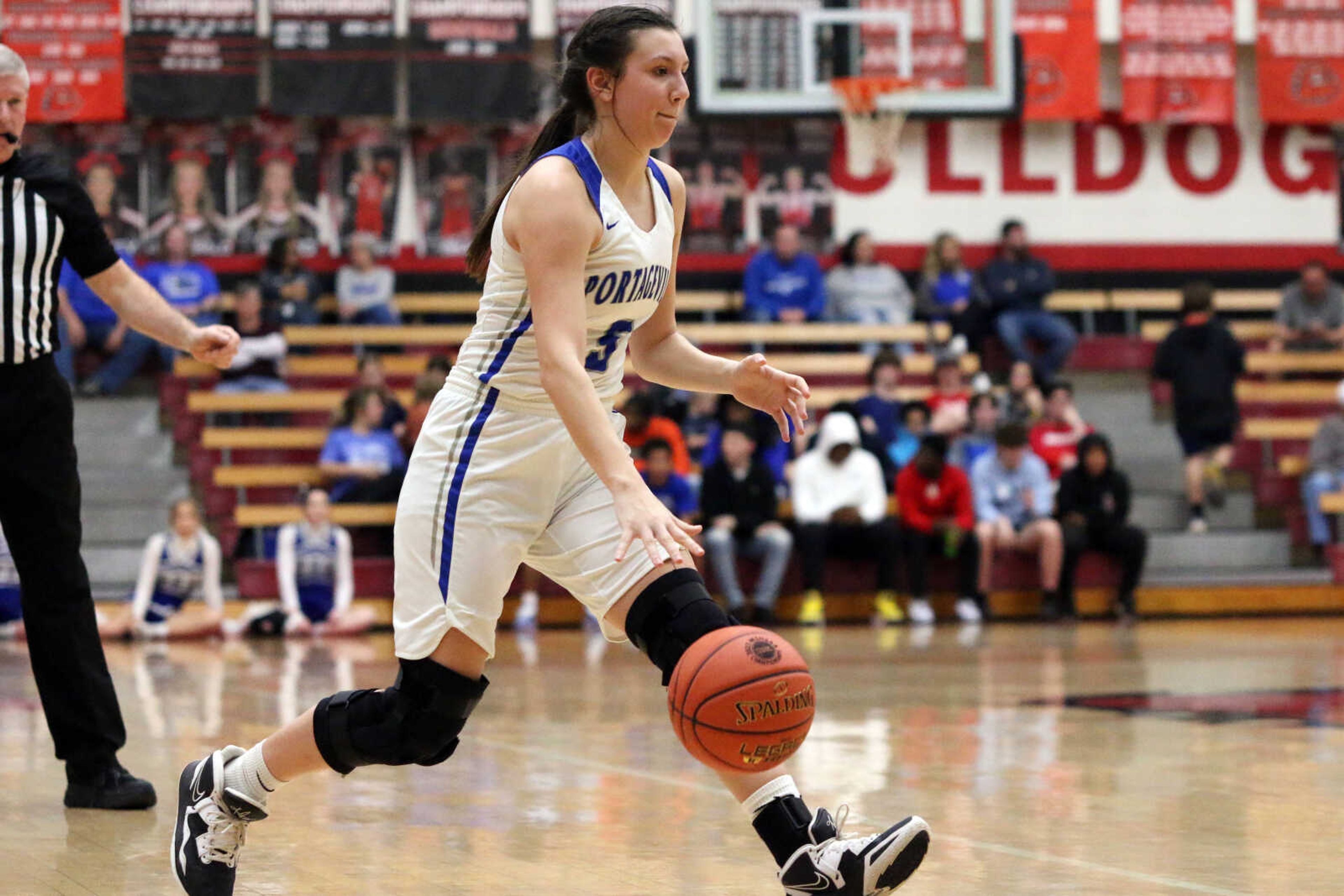 Portageville's Laney Stone (5) dribbles&nbsp;during a 61-25 win over Woodland in a MSHSAA Class 3 Sectional at the Sikeston Fieldhouse on Monday, Feb. 28. (Dennis Marshall/Standard-Democrat)