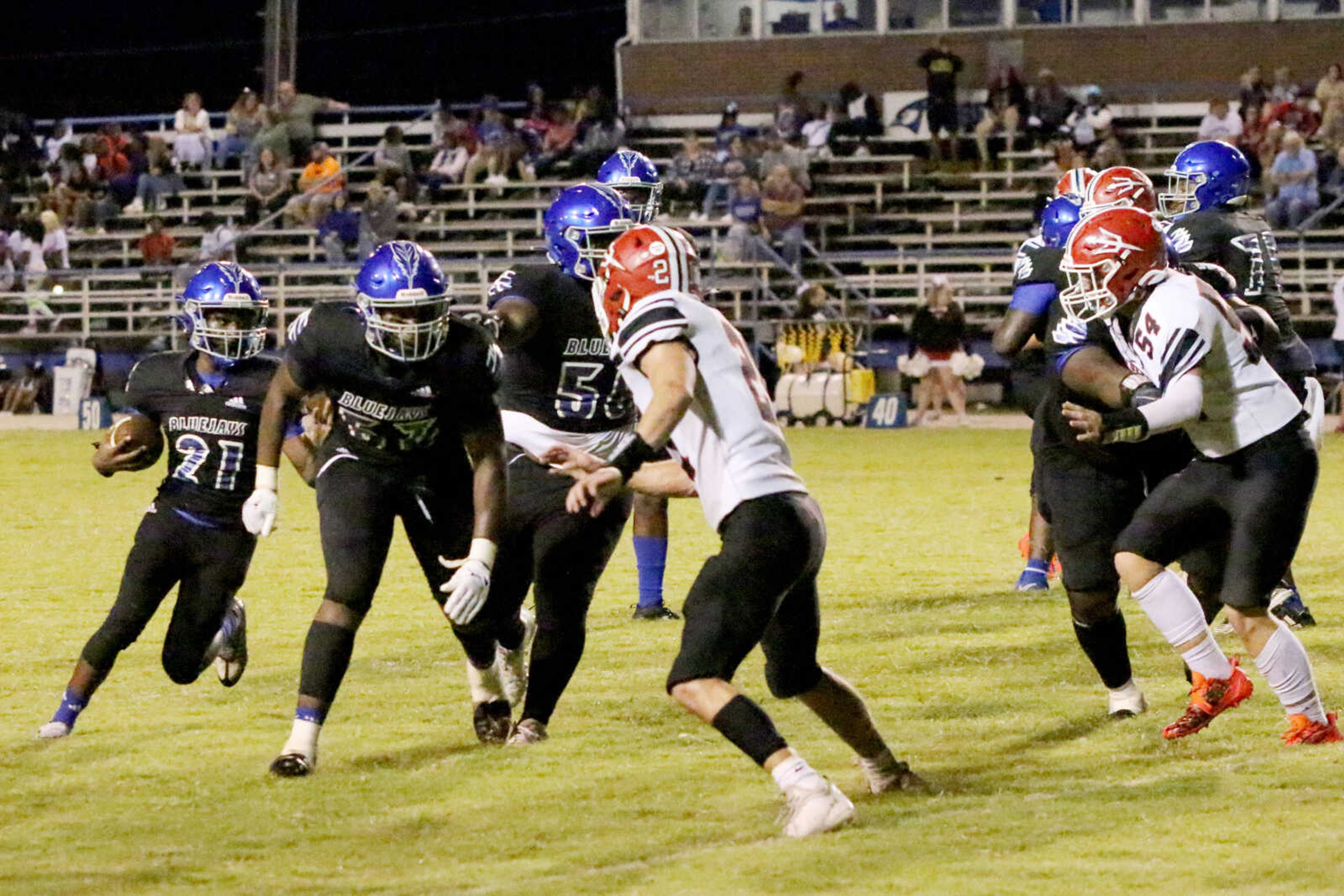 Charleston's J'Maurion Robinson (21) runs&nbsp;during a 14-12 loss to Chaffee at John Harris Marshall Stadium on Thursday, August 31, 2023.&nbsp;