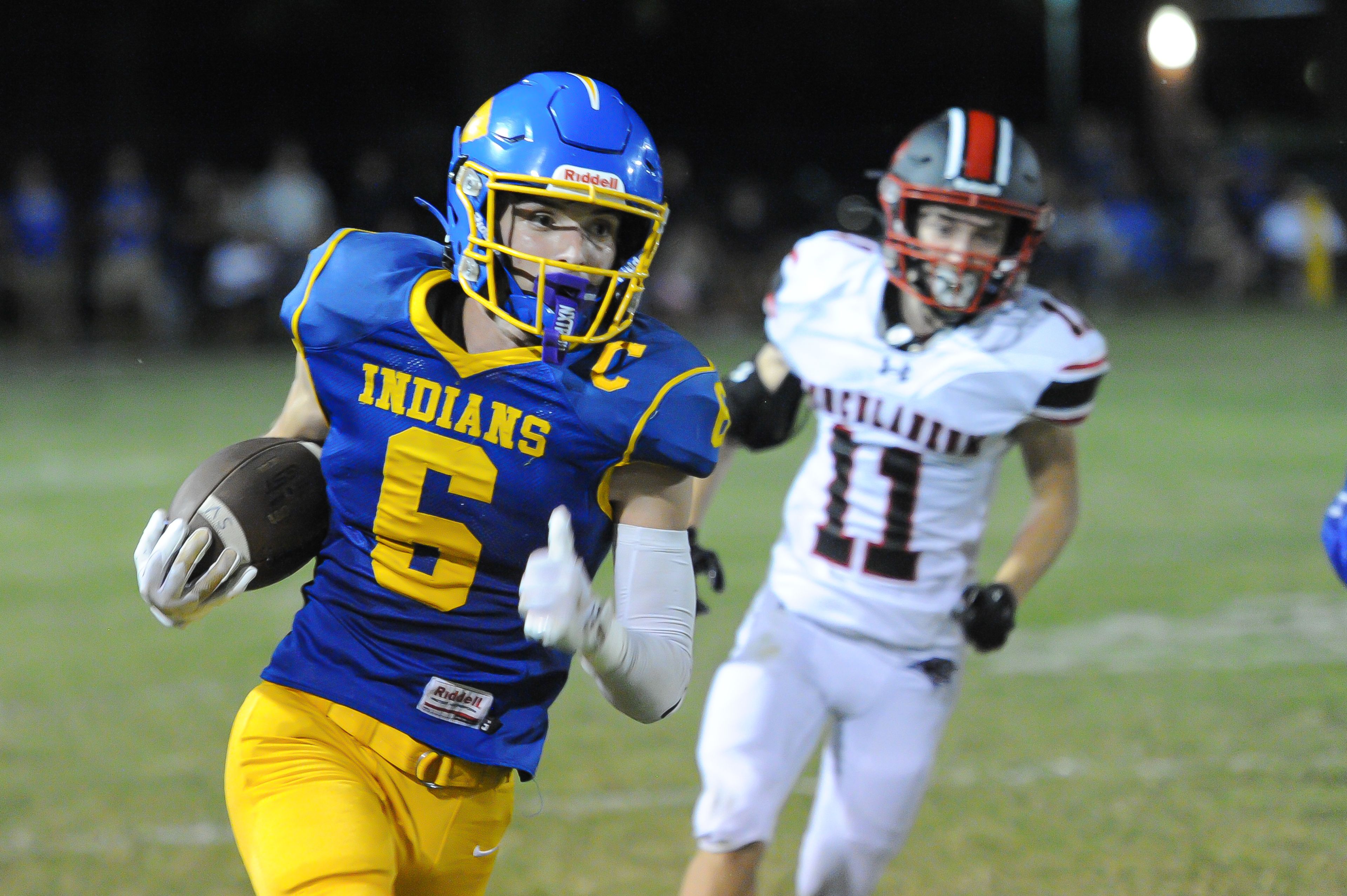 St. Vincent's Clayton Gremaud sprints up the sideline during a Friday, September 20, 2024 game between the St. Vincent Indians and the Herculaneum Blackcats at St. Vincent High School in Perryville, Mo. St. Vincent defeated Herculaneum, 47-7.