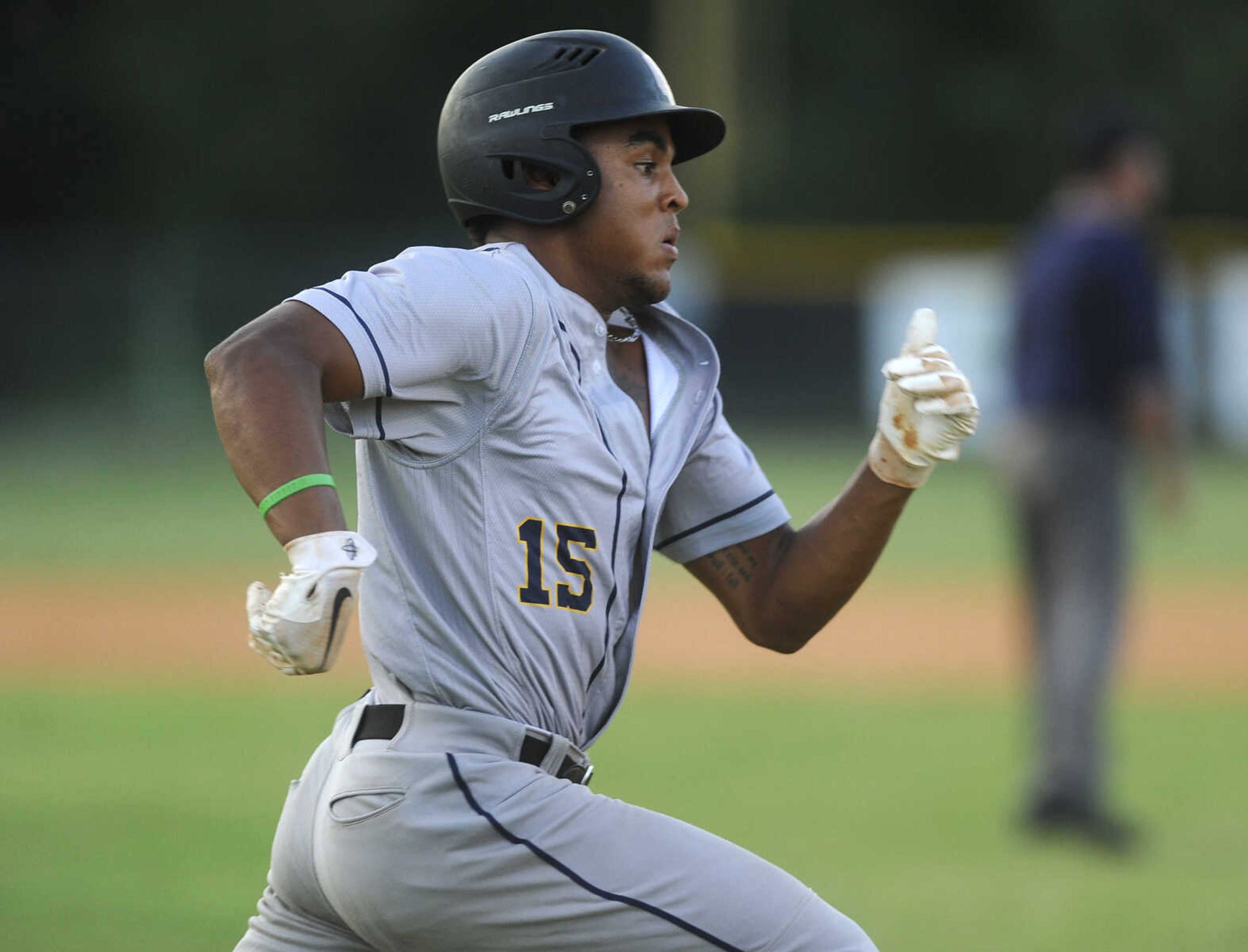 FRED LYNCH ~ flynch@semissourian.com
Cape Girardeau Post 63's Joseph Baker runs to first base on a single against Jackson Post 158 during the second inning of a semifinal in the Senior Legion District Tournament Friday, July 13, 2018 in Sikeston, Missouri.