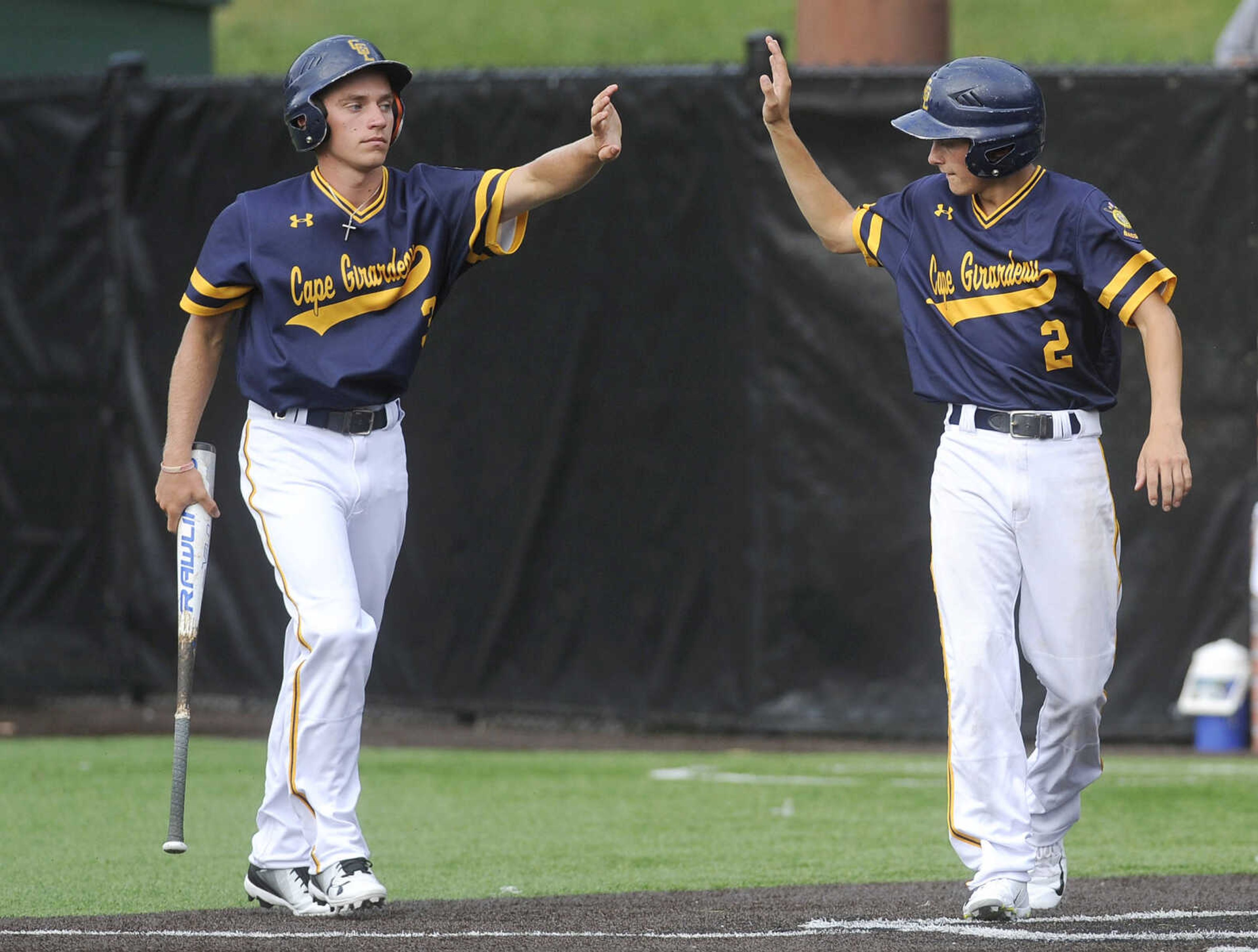 FRED LYNCH ~ flynch@semissourian.com
Cape Girardeau Post 63's Cole Emmenderfer, left, and Brenden Wilkens celebrate after both scored on a hit by Layne Robinson against Sikeston during the second inning of the first game Wednesday, June 20, 2018 at Capaha Field.