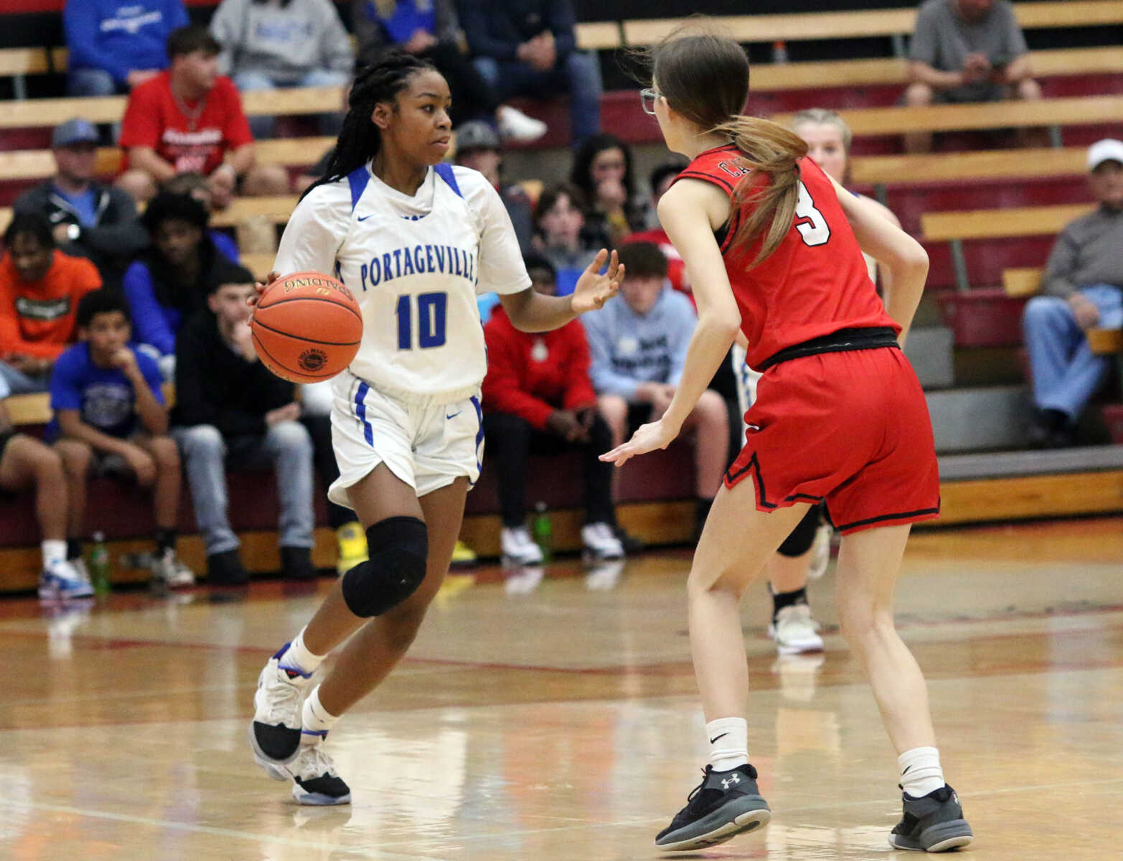 Portageville's Glo Farmer (10) dribbles&nbsp;during a 61-25 win over Woodland in a MSHSAA Class 3 Sectional at the Sikeston Fieldhouse on Monday, Feb. 28. (Dennis Marshall/Standard-Democrat)